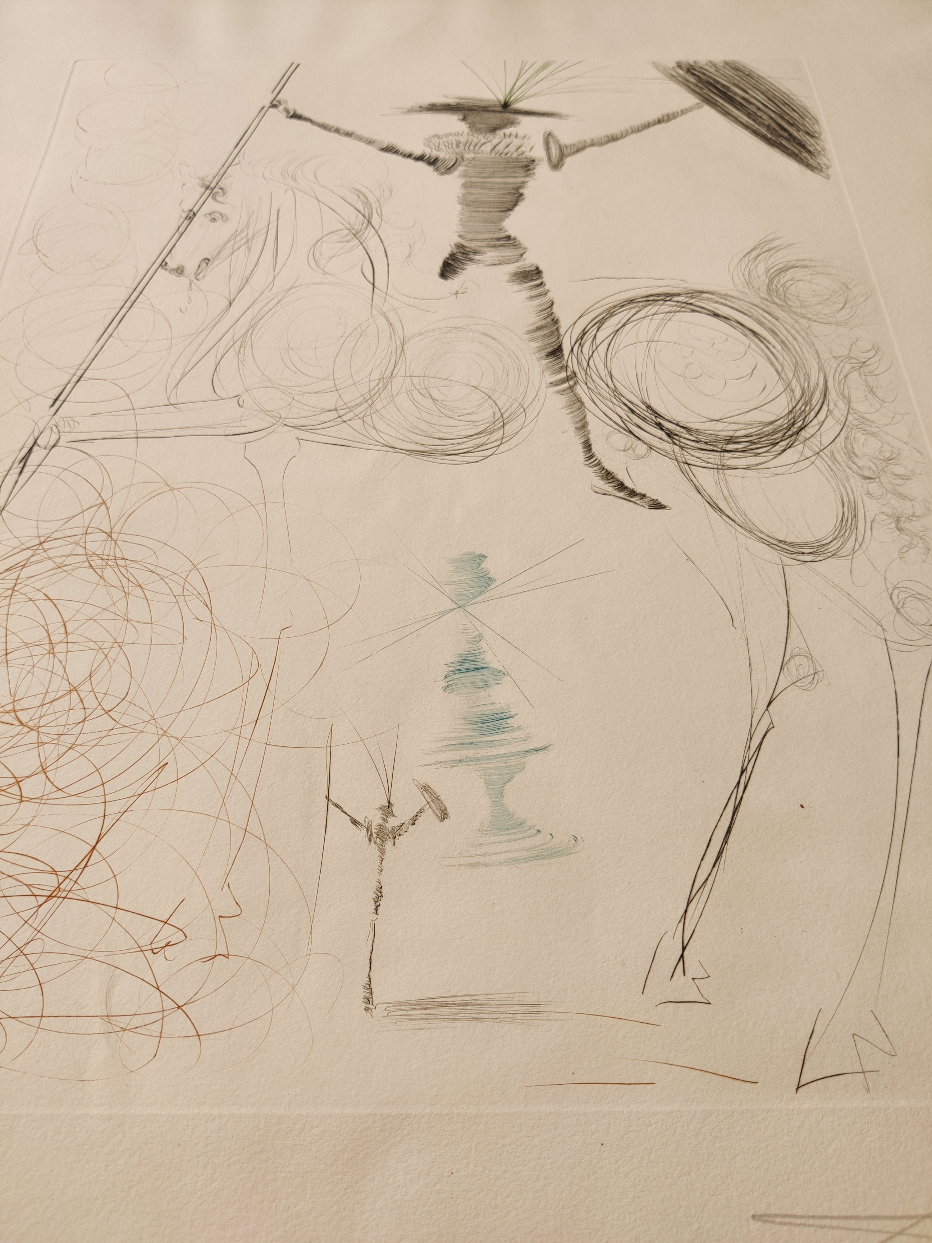 A drawing of a man on a horse with a stick.
