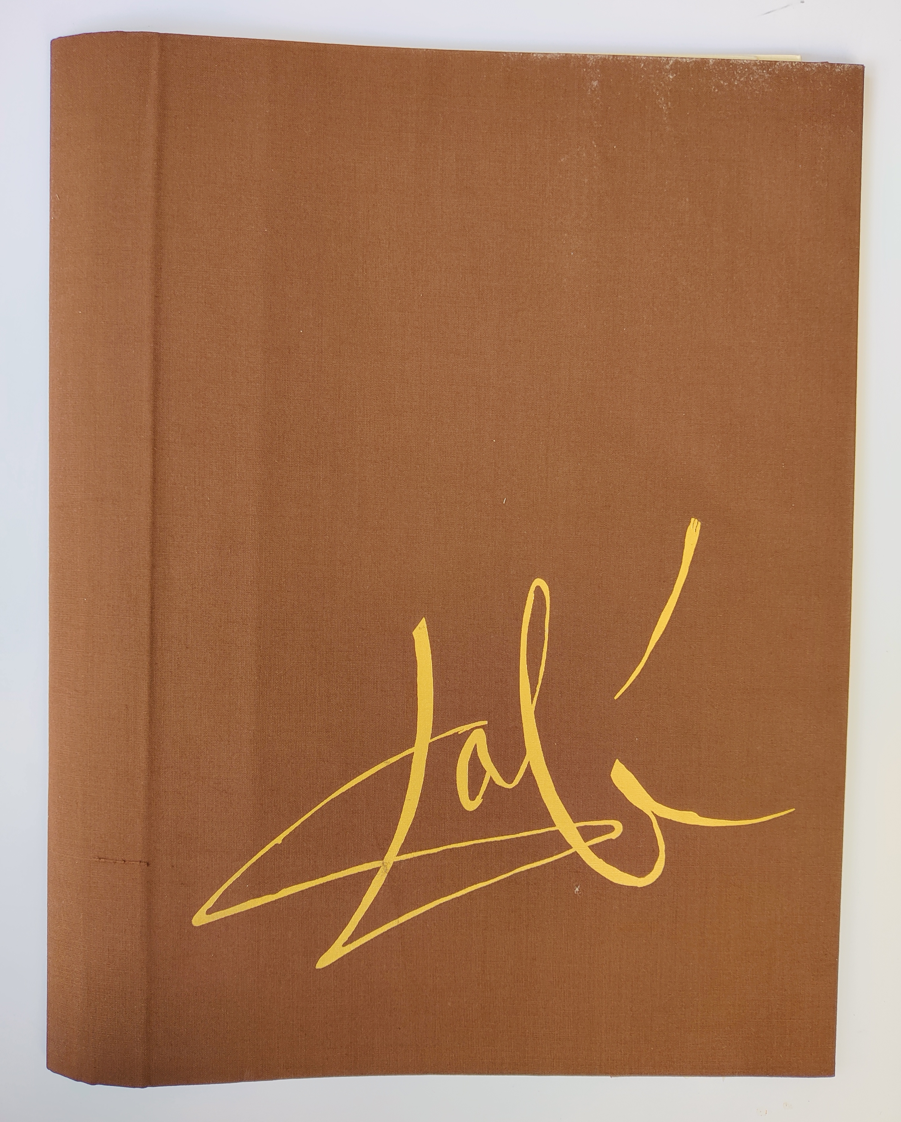 A painting of a cat sitting on top of a table.