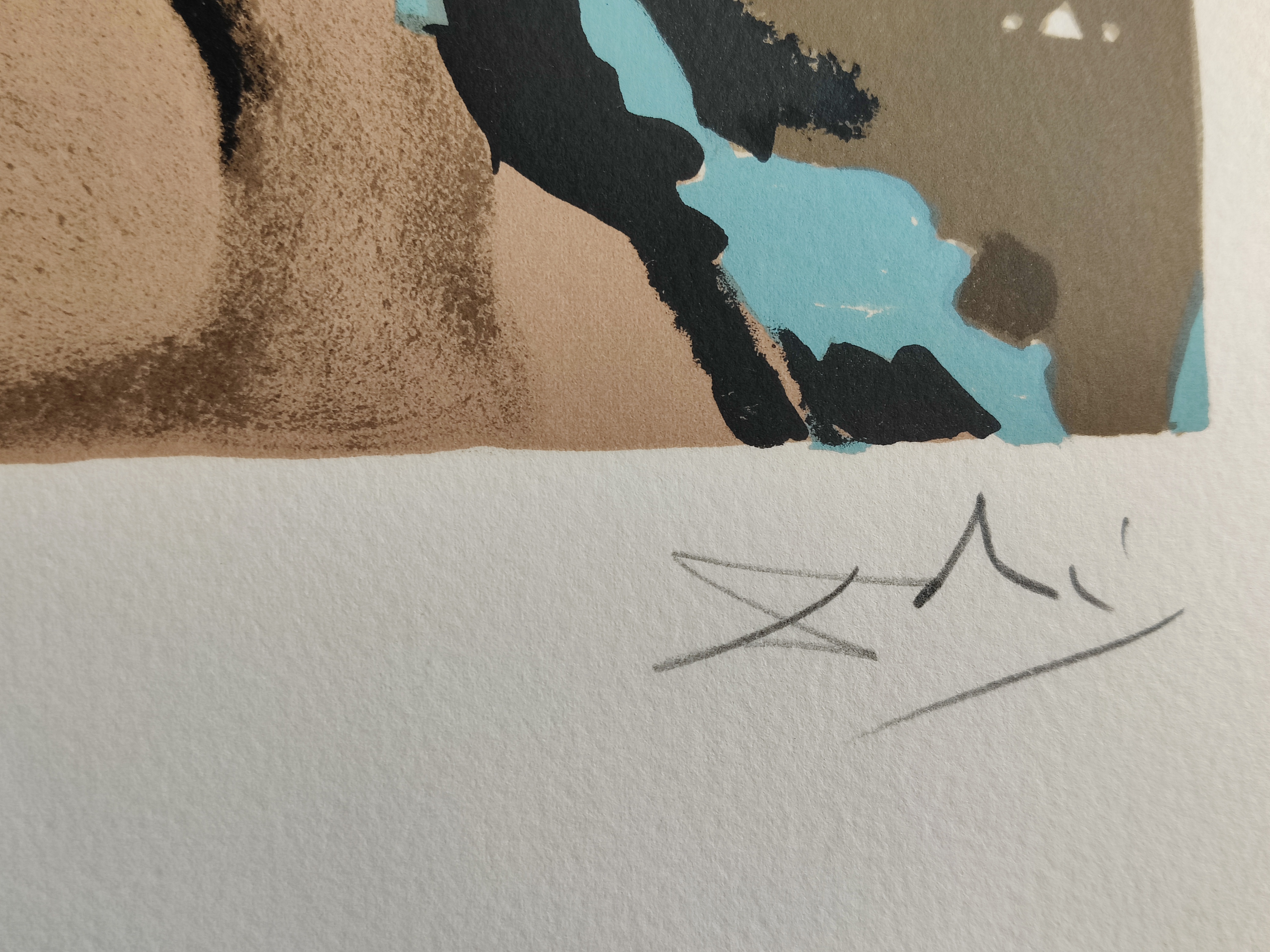 A surreal print of two nude figures emerging from a mound against a starry blue background.
