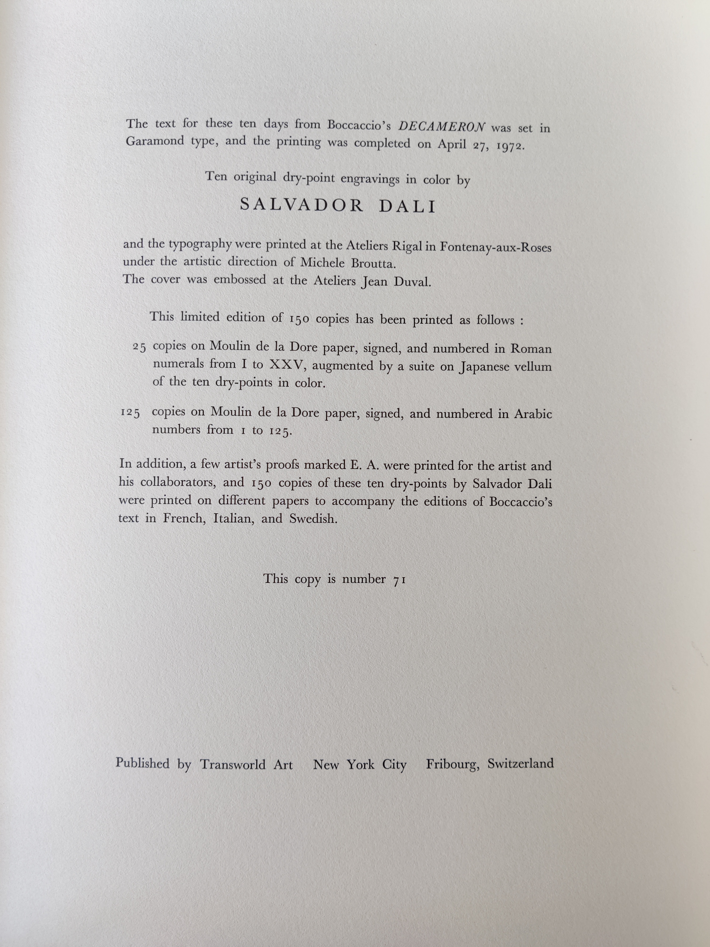 A series of drawings on a white wall. 