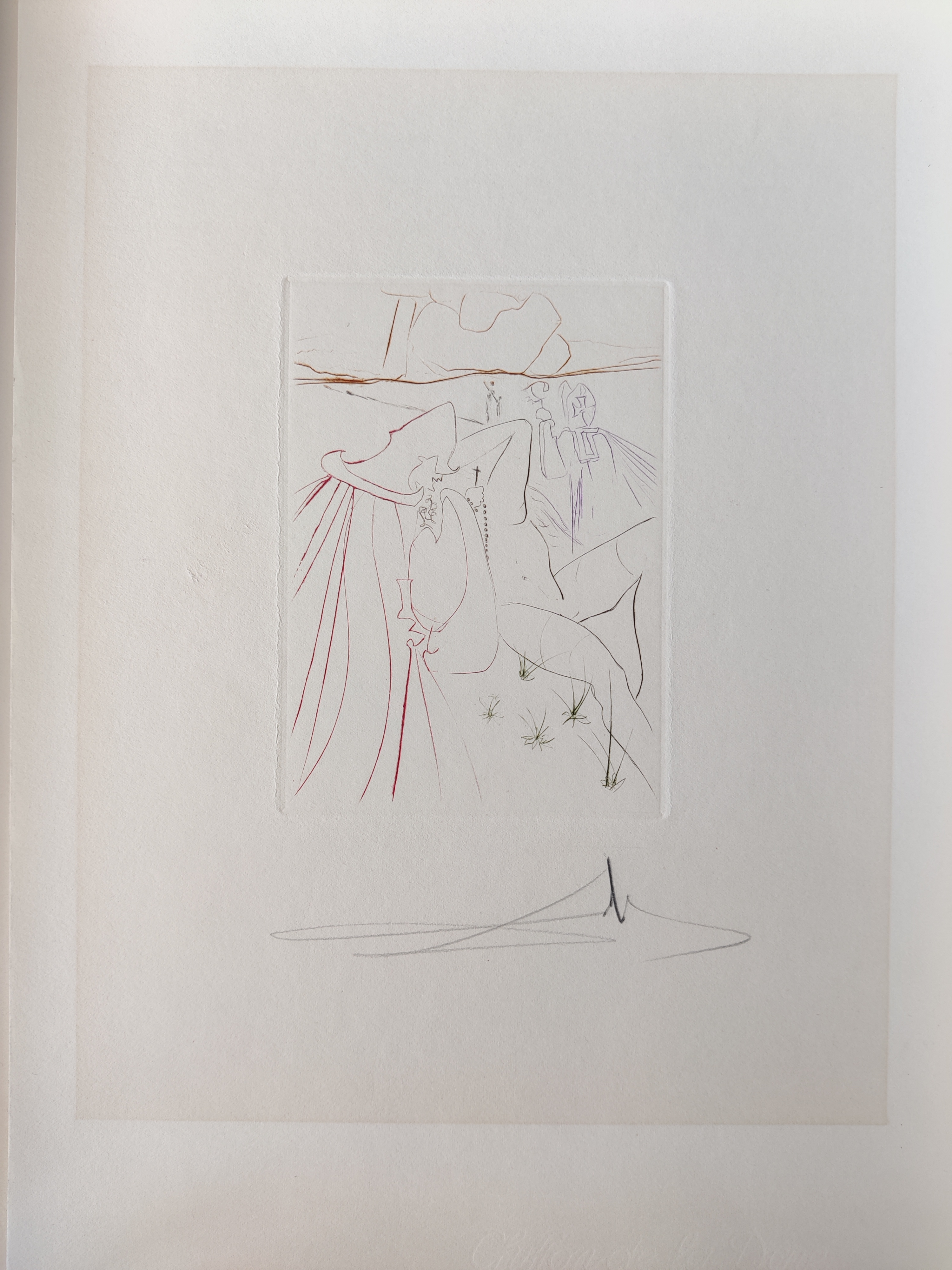 A series of drawings on a white wall. 