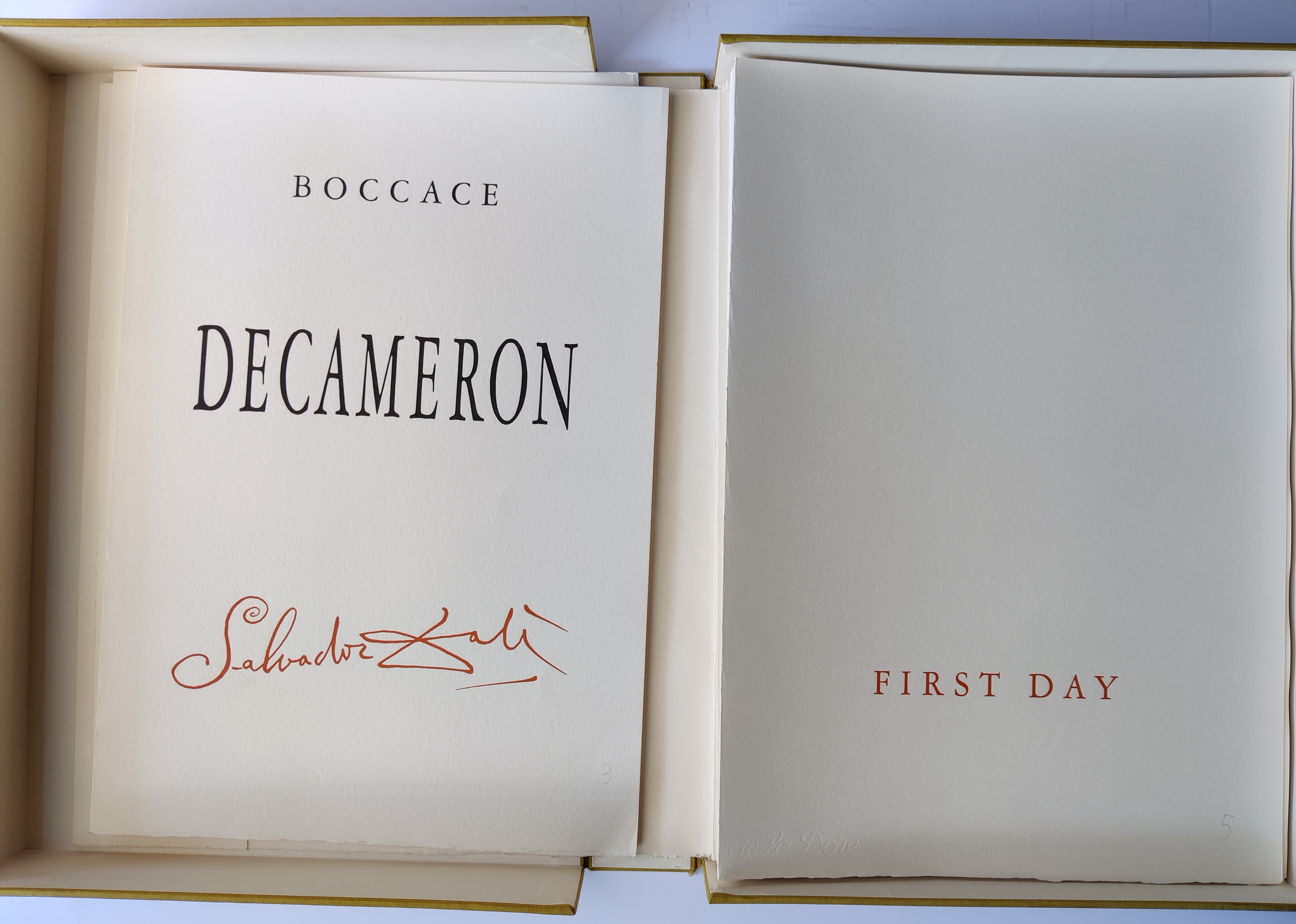 A series of drawings on a white wall. 