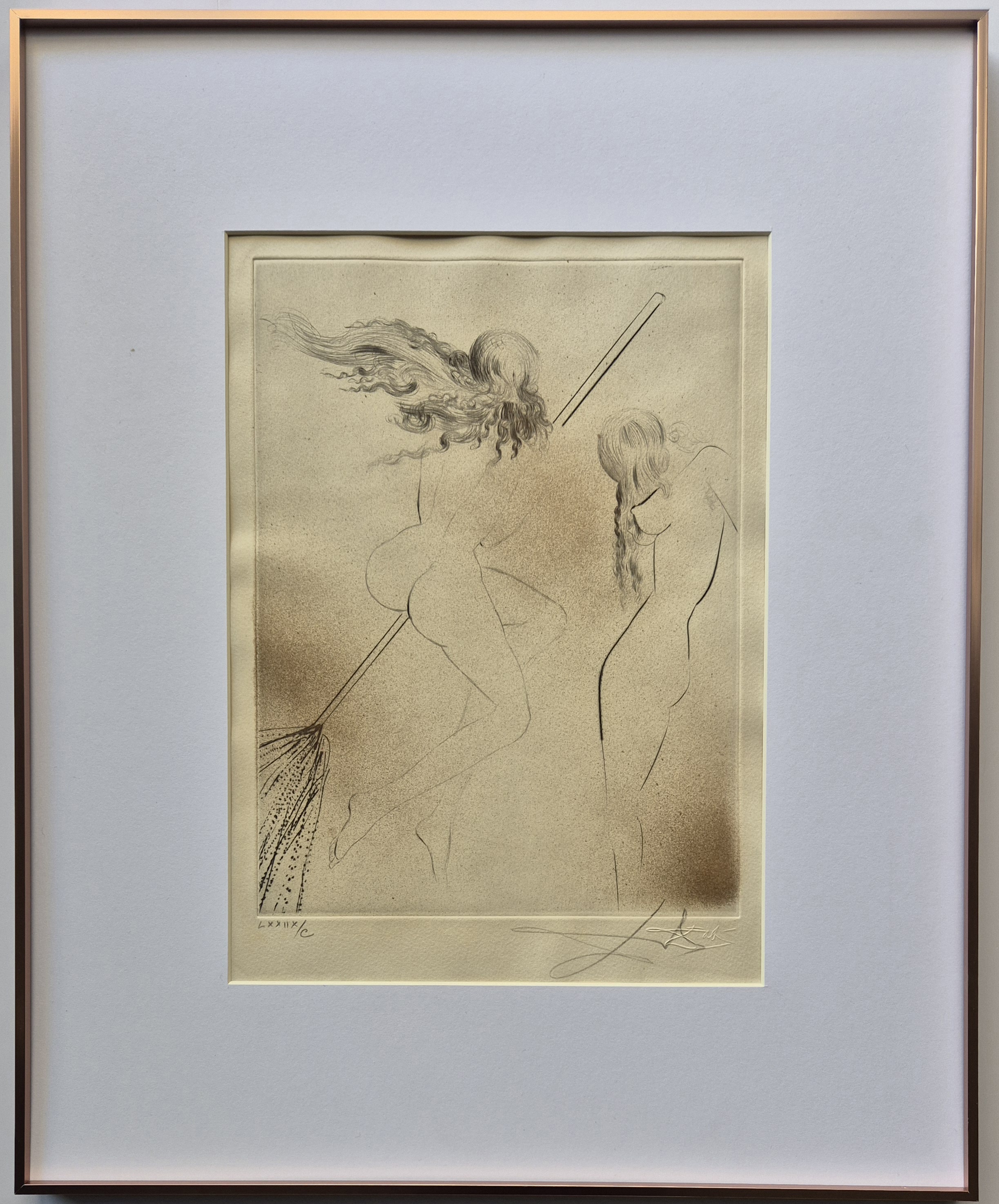 A framed charcoal drawing of two nude figures in a dynamic, sketchy style.
