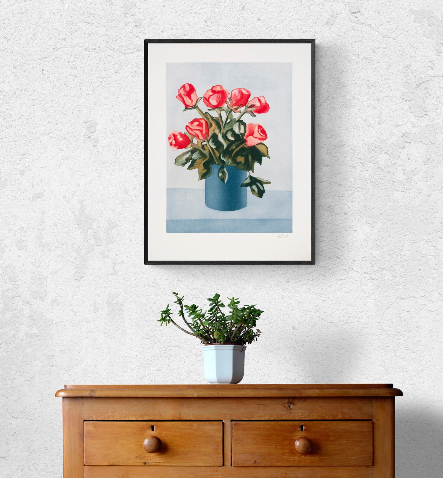 A vibrant still life of red roses in a blue vase against a pale blue background.
