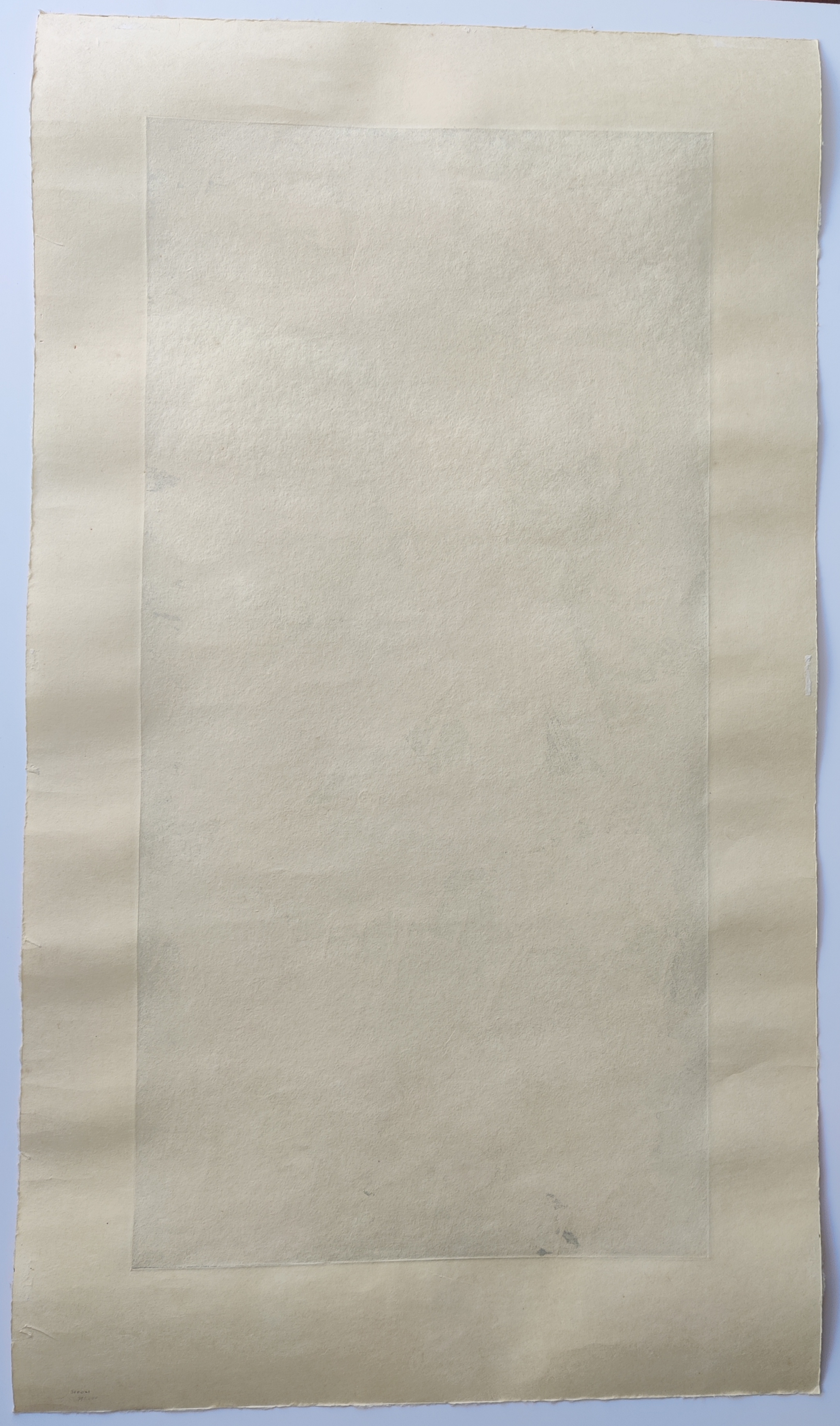 A red and black print on a piece of paper.