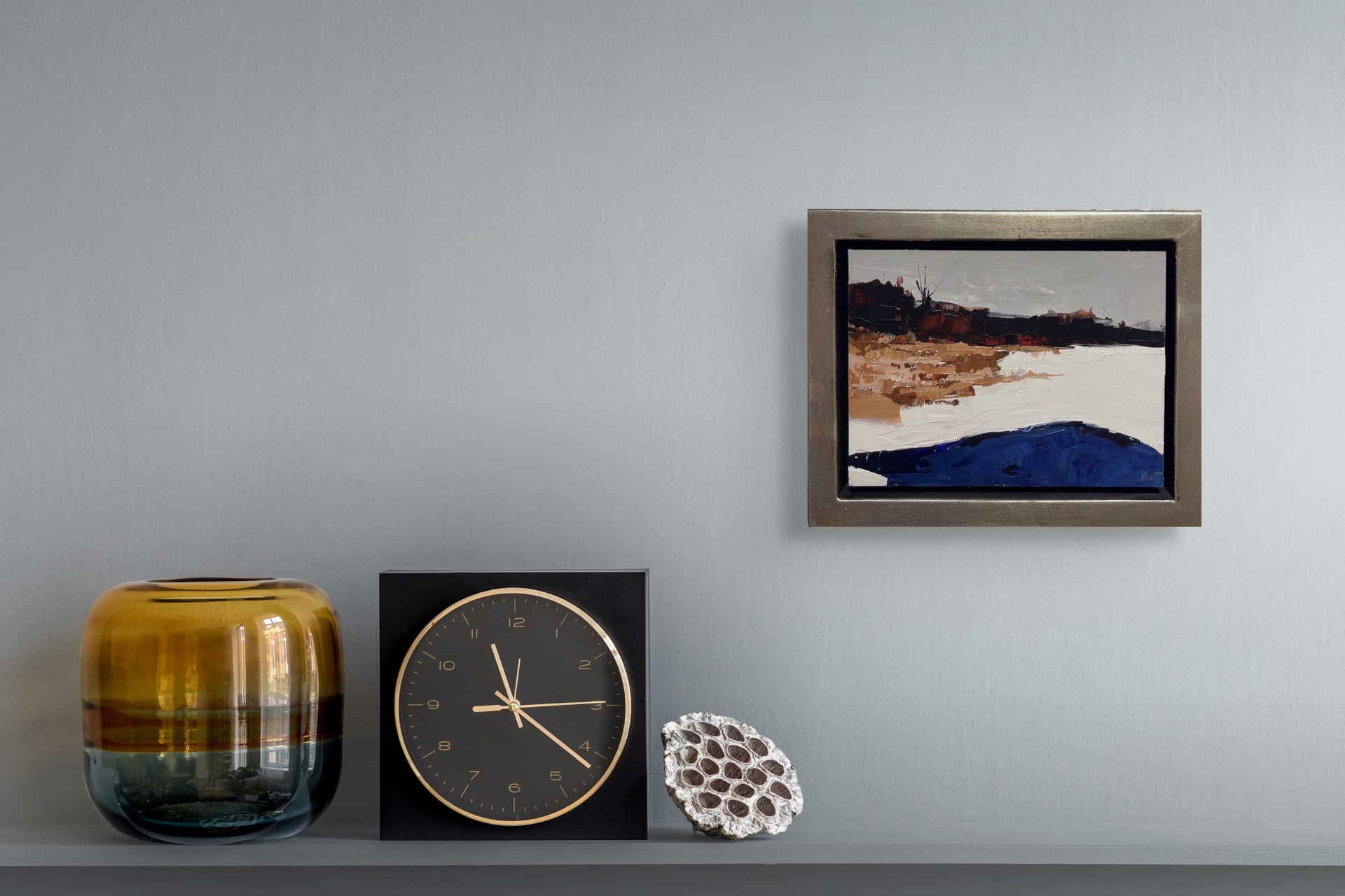 A painting of a landscape with a blue and brown color palette.