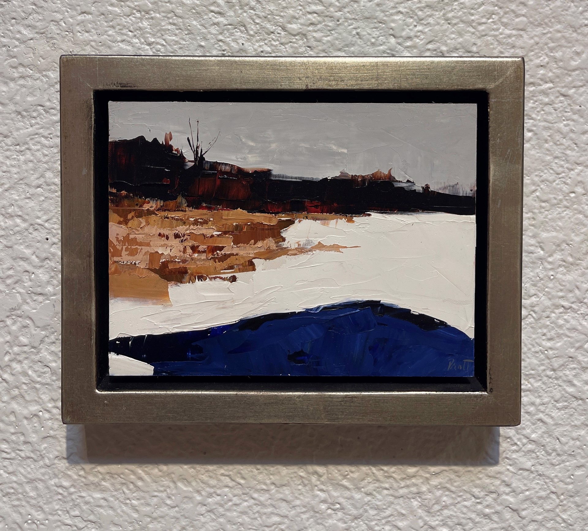 A painting of a landscape with a blue and brown color palette.