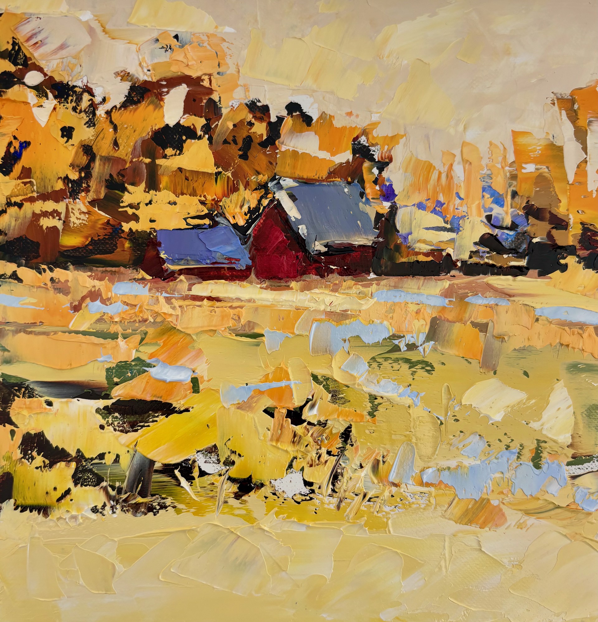 A painting of a yellow field with a red barn in the distance.