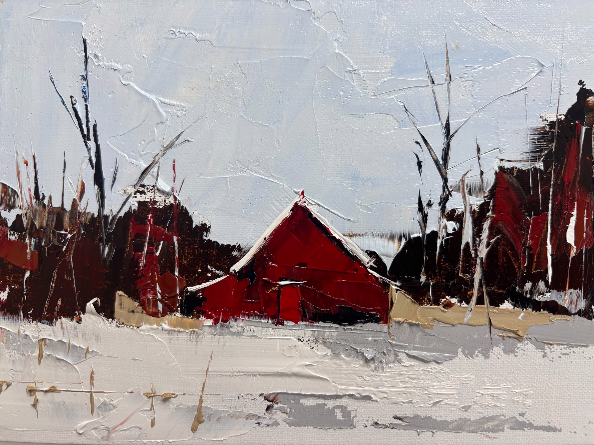 A textured winter landscape featuring a red barn against a pale sky.