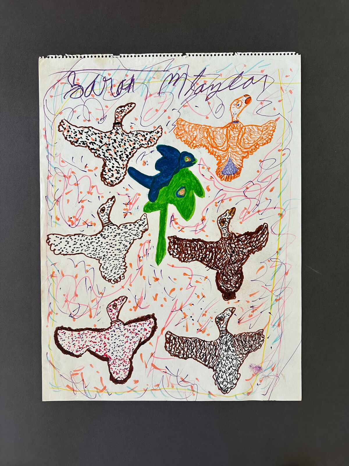 A drawing of a group of birds flying in the air.