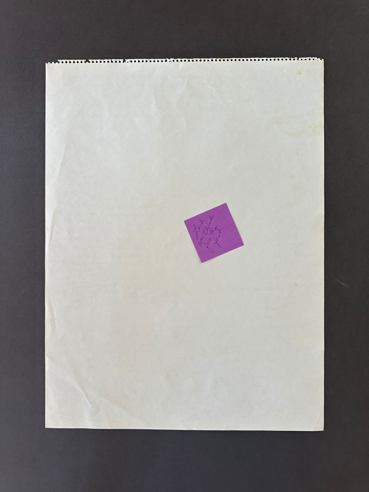 A piece of paper with handwriting on it. 