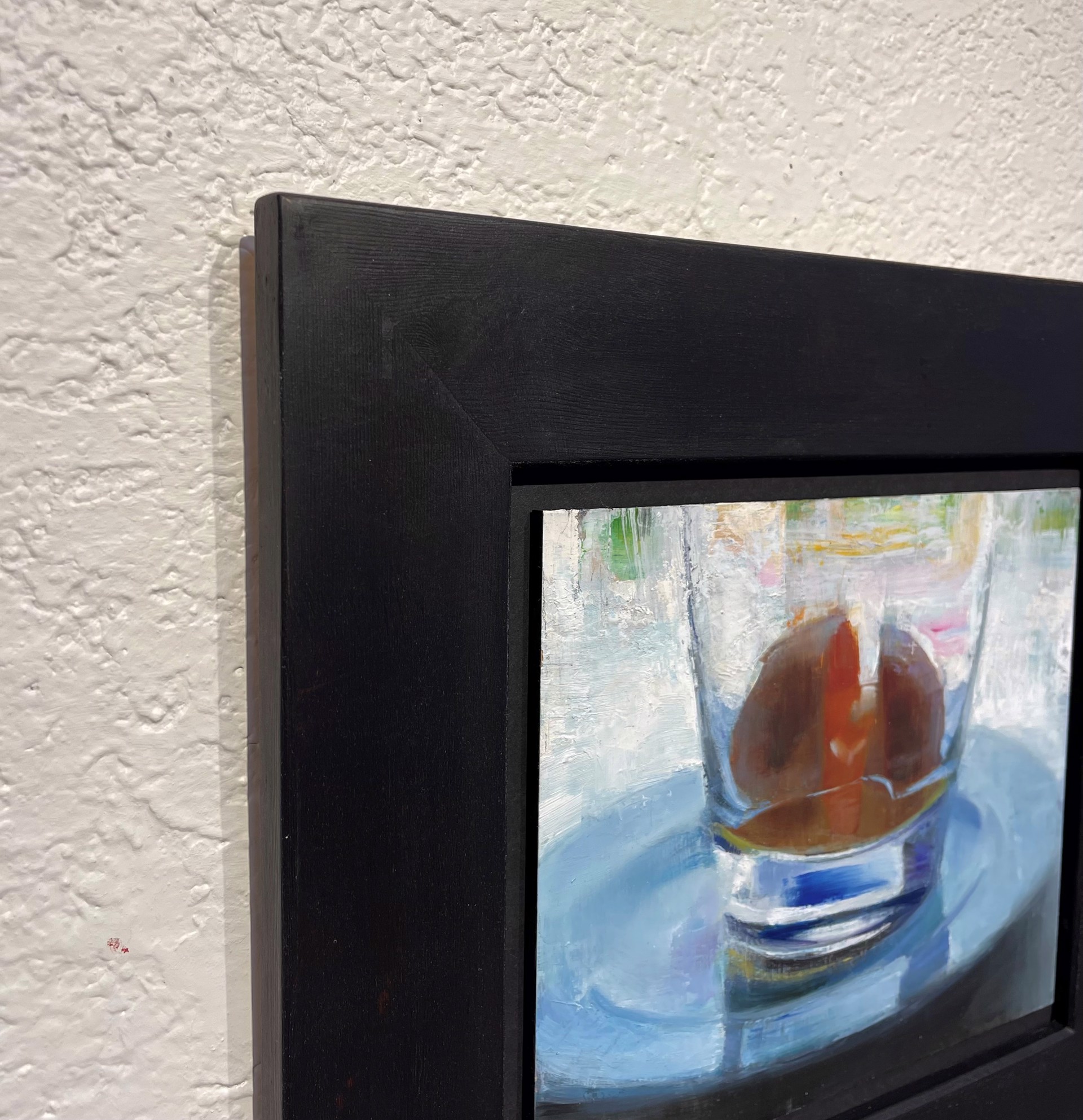 A close-up oil painting of a glass filled with amber liquid and ice cubes, resting on a reflective saucer.