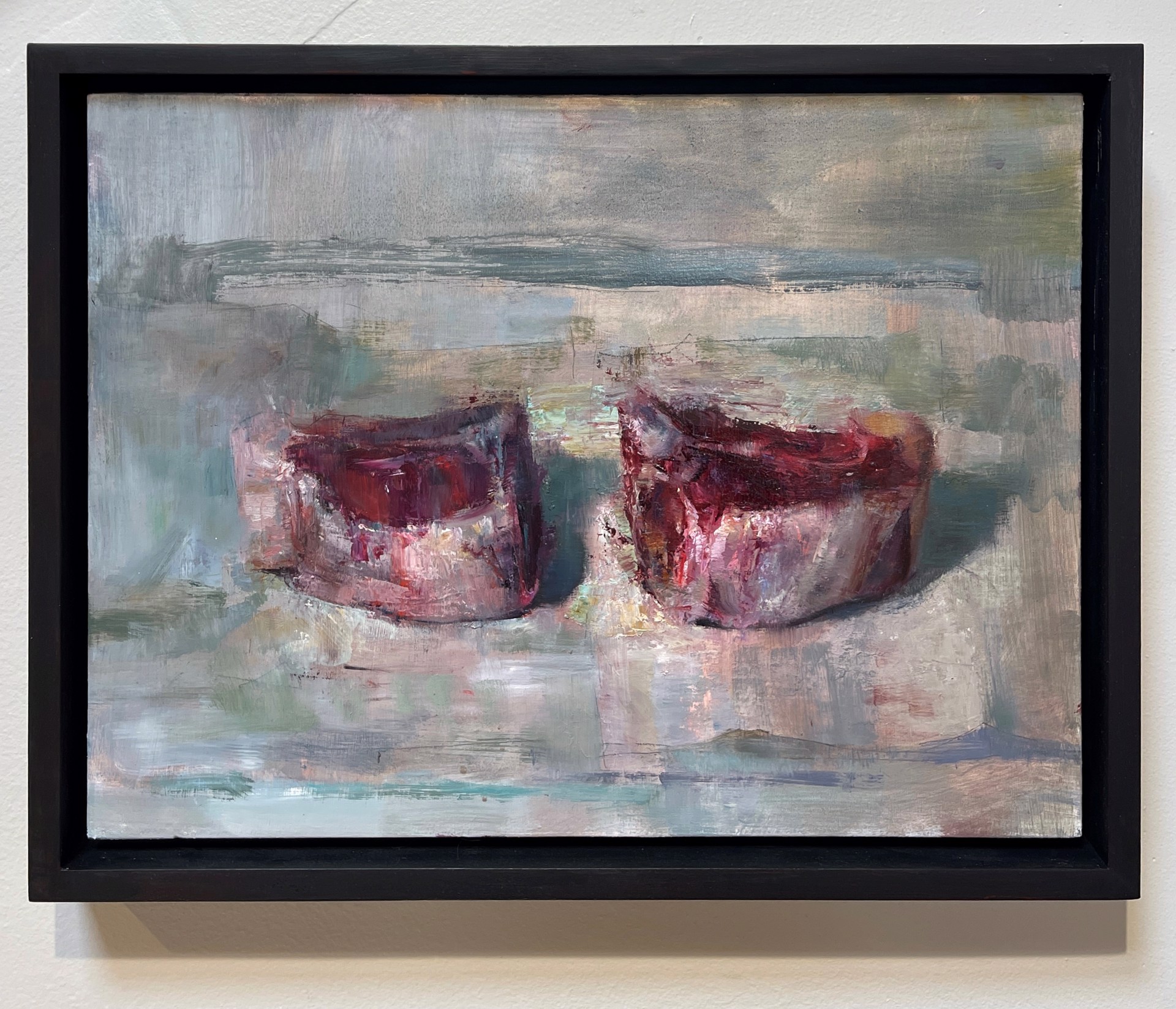 A painting of two red candles on a white surface.