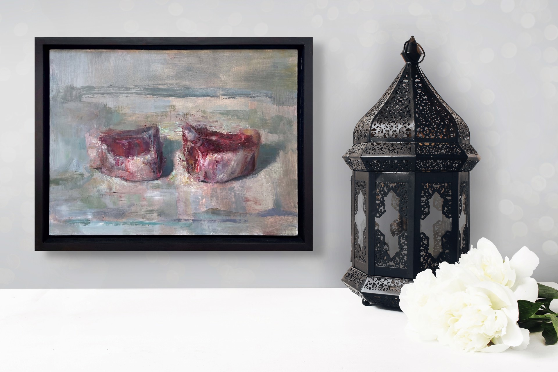 A painting of two red candles on a white surface.