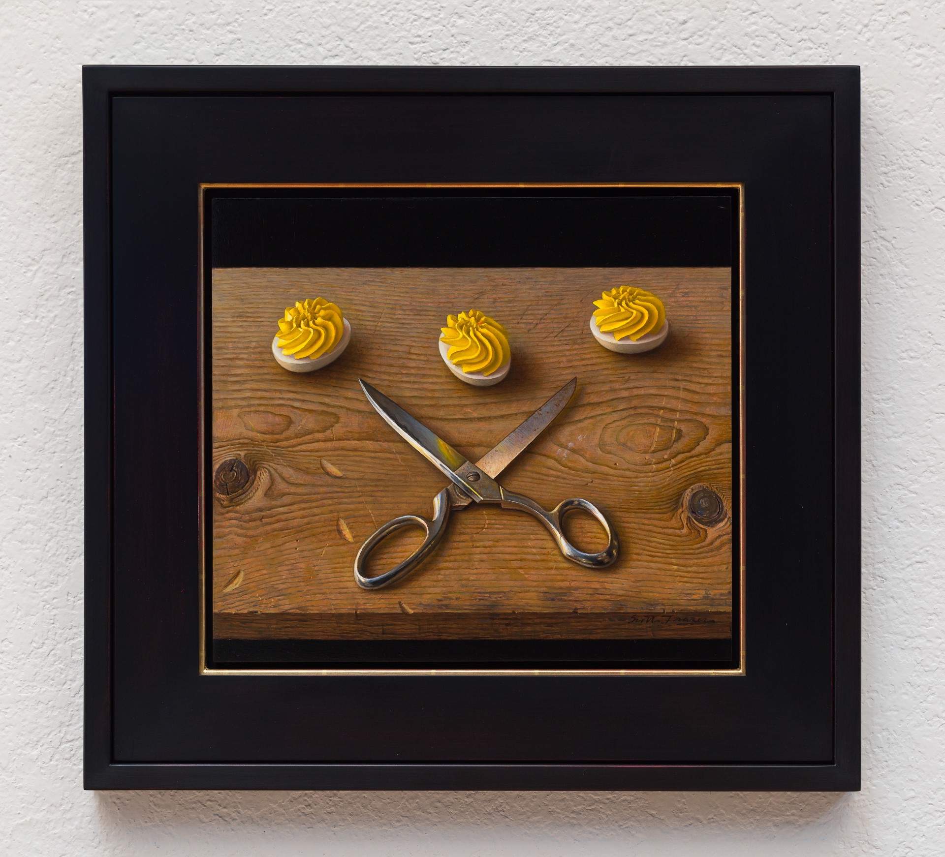 A still life painting featuring crossed silver scissors and three white discs topped with yellow frosting on a wooden surface.