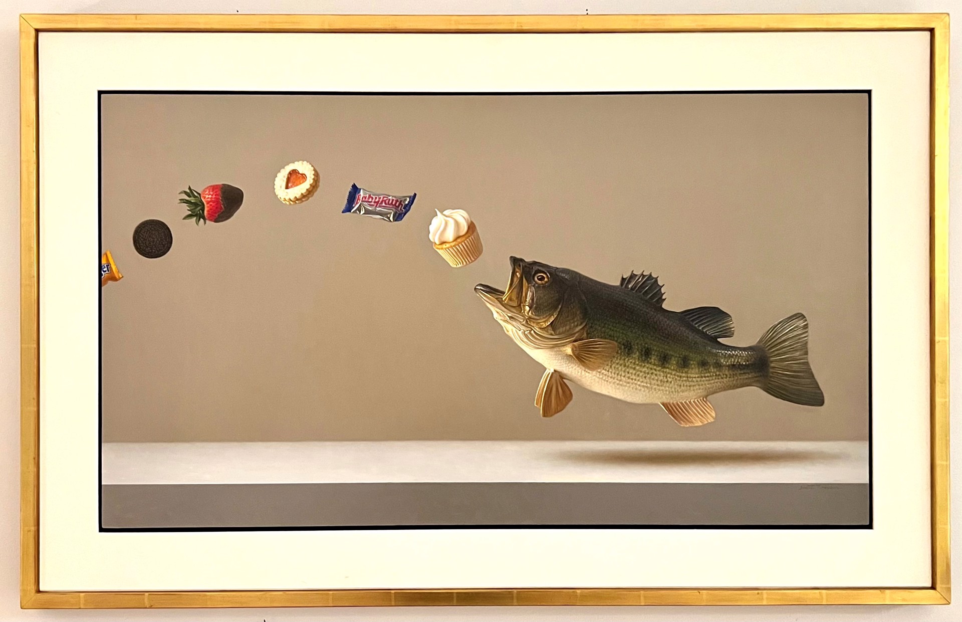 A hyper-realistic painting of a fish mid-air, mouth open to catch a cupcake, with a trail of floating sweets behind it.