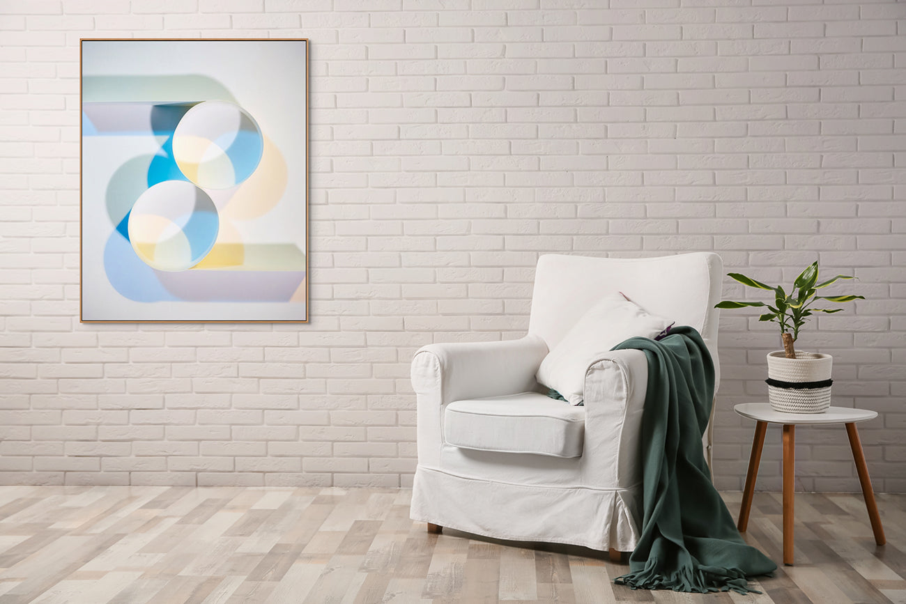 A picture of three circles on a white surface. 