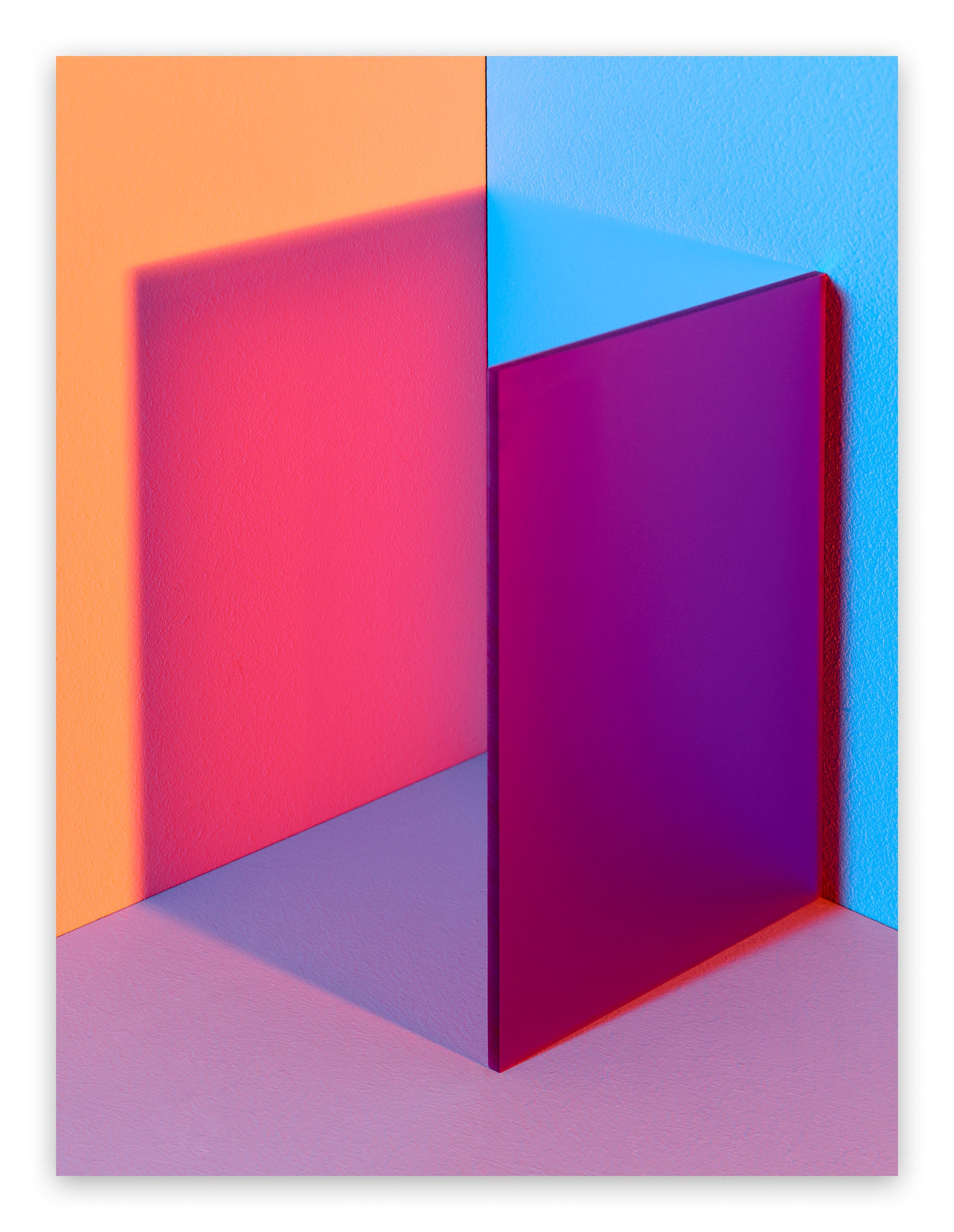 A picture of a pink and blue cube in a room.