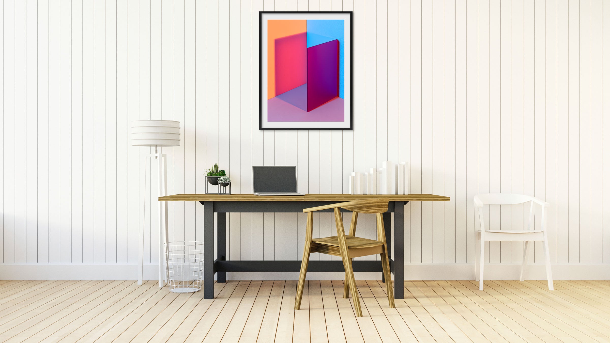 A picture of a pink and blue cube in a room.