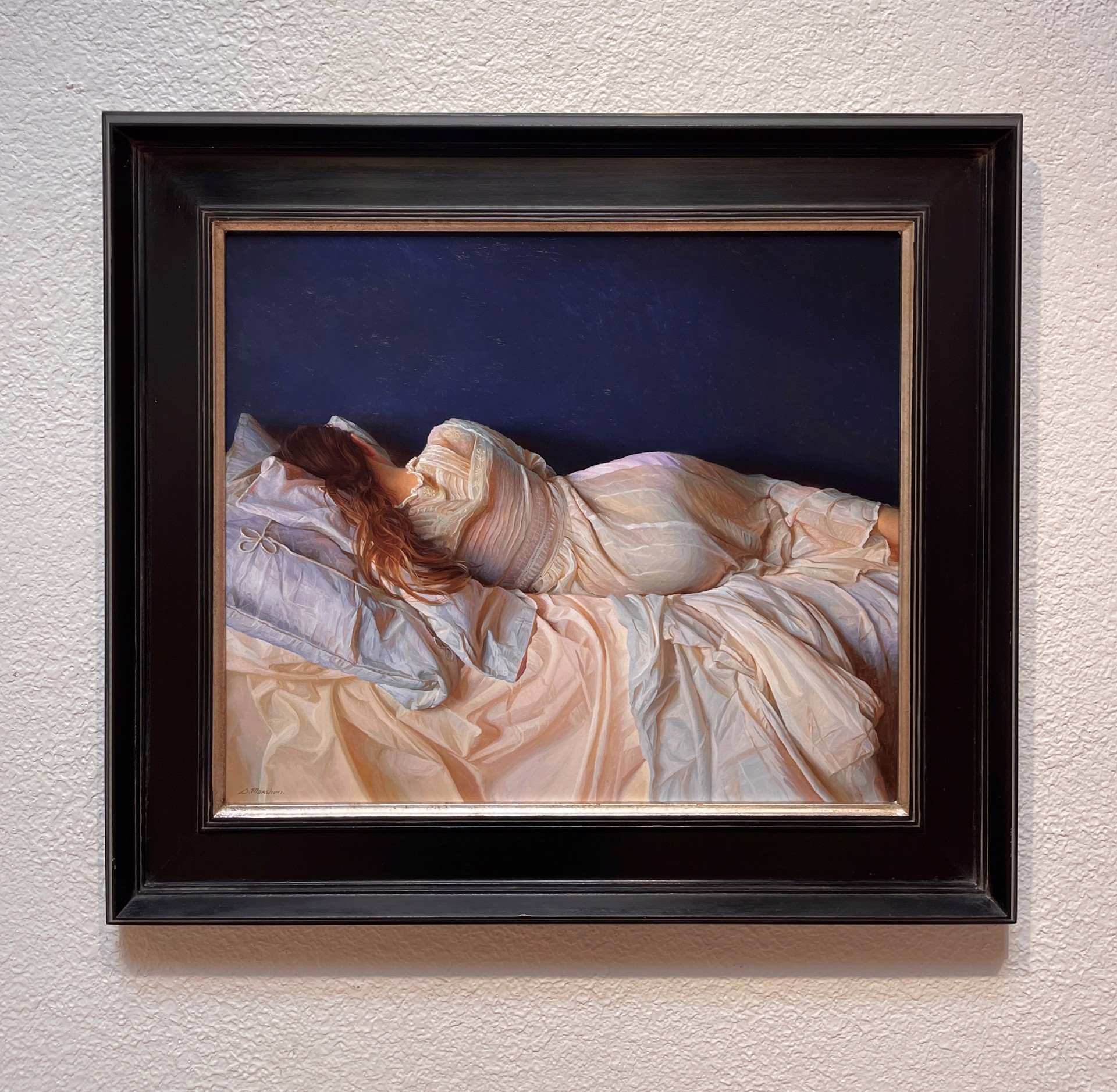 A painting of a woman laying on a bed.