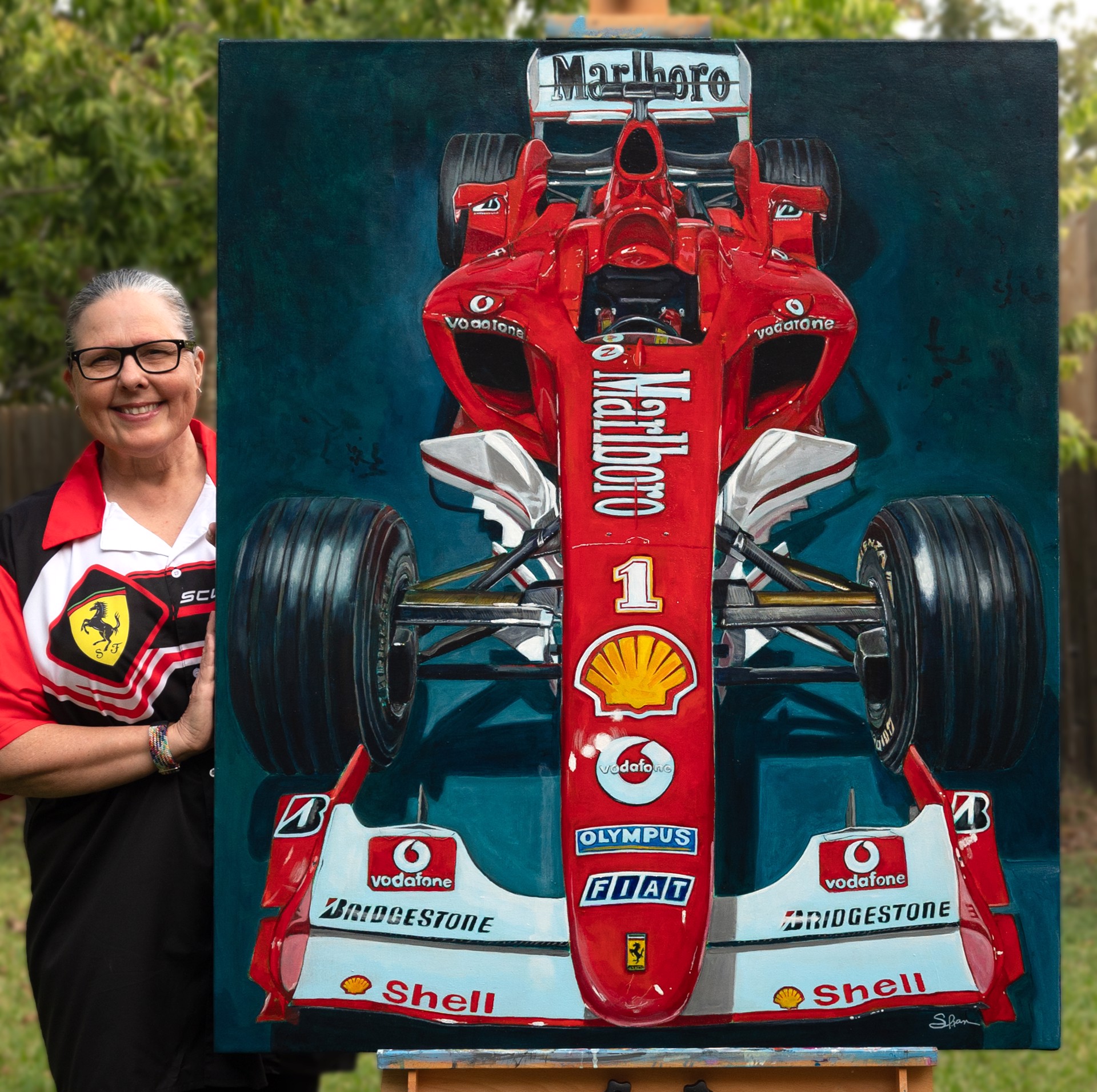 A detailed painting of a Formula One race car viewed from the front.