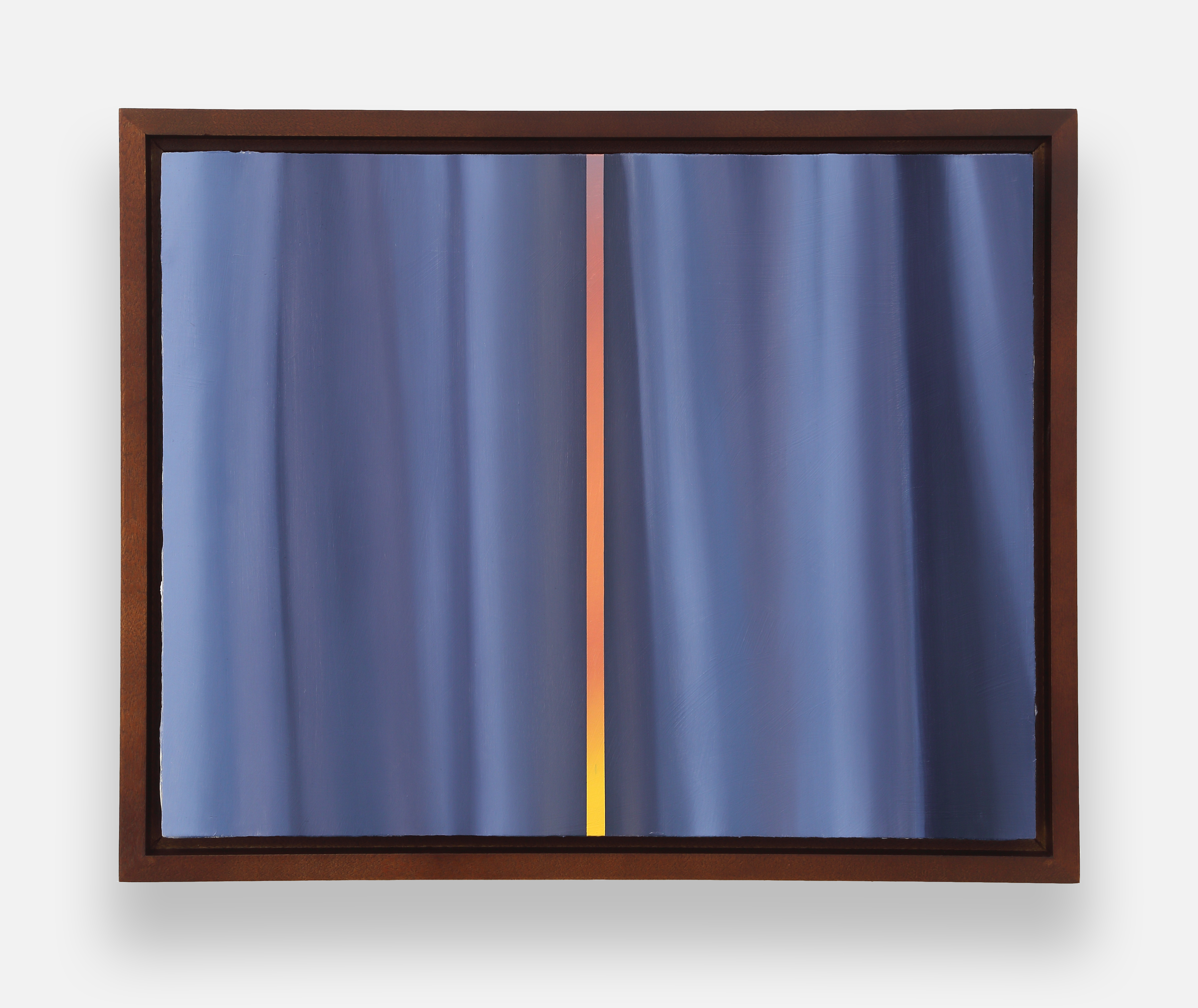 A picture of a window with a blue curtain in it.