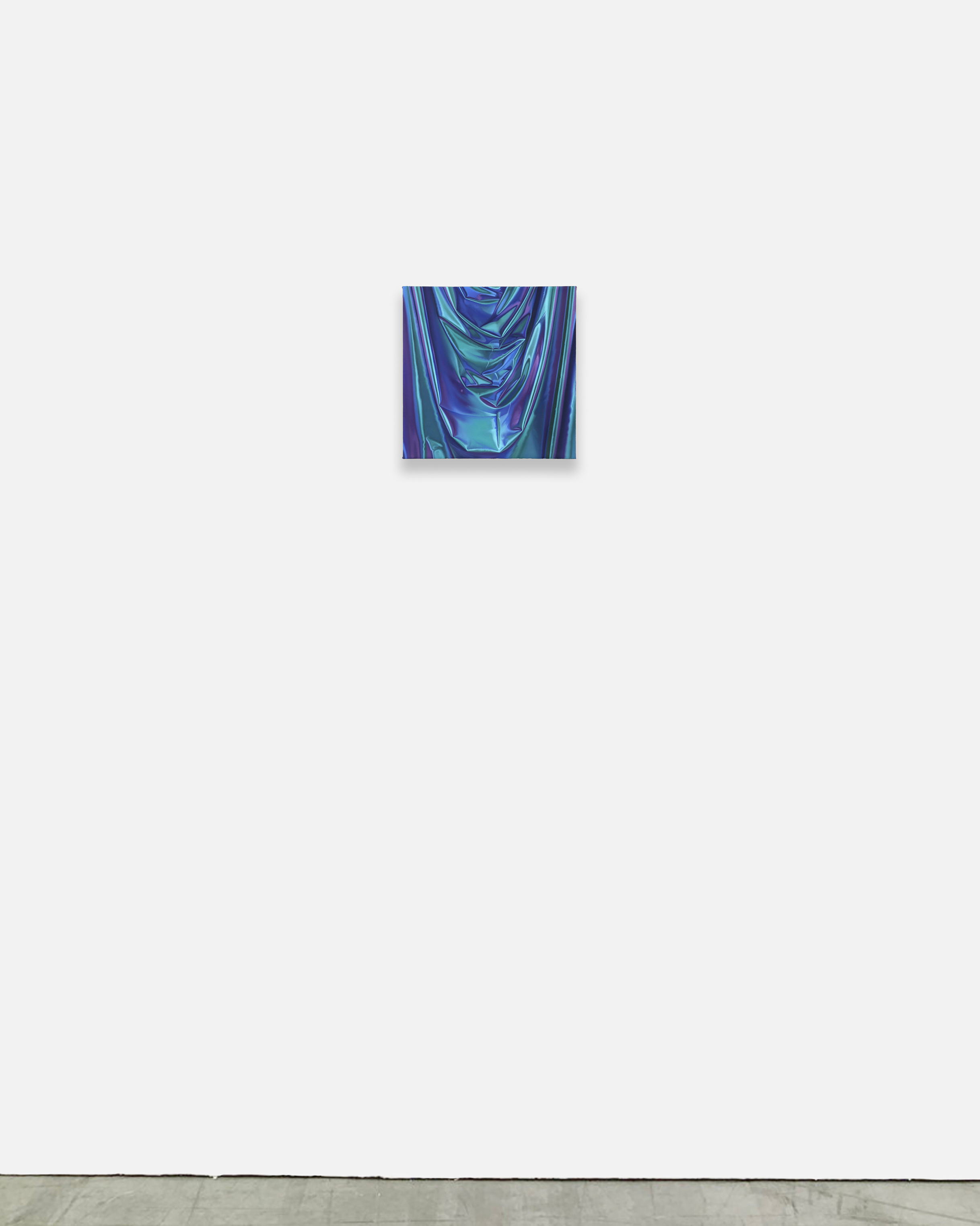 a close up of a blue and purple fabric on a white background