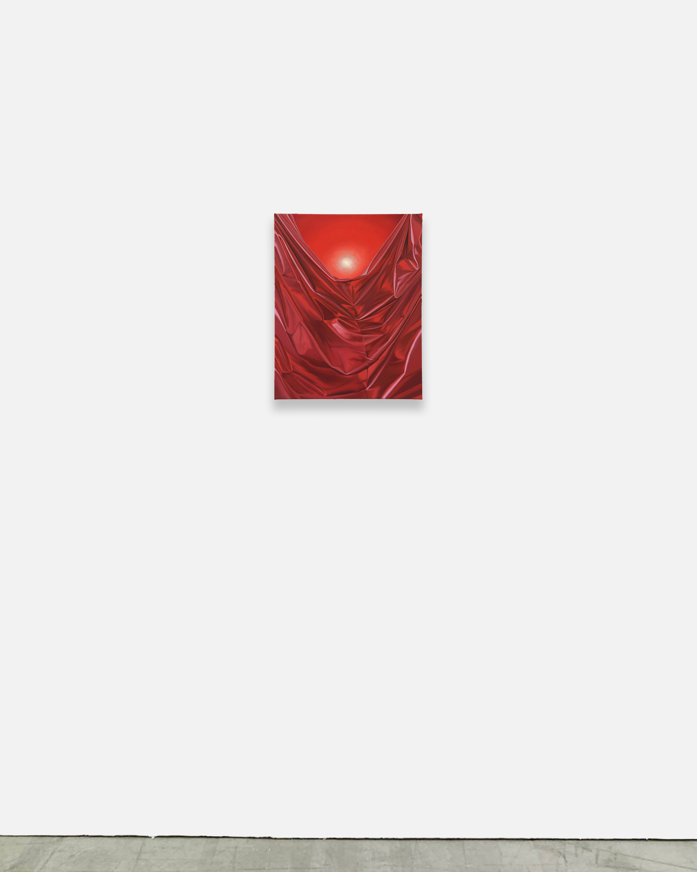 A painting of a red cloth with a sun in the background.