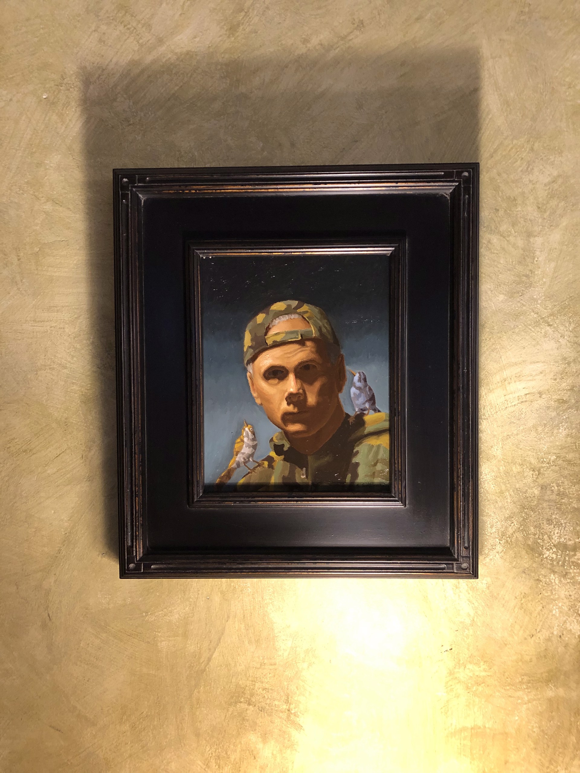 A painting of a man in a military uniform with two birds on his shoulder.