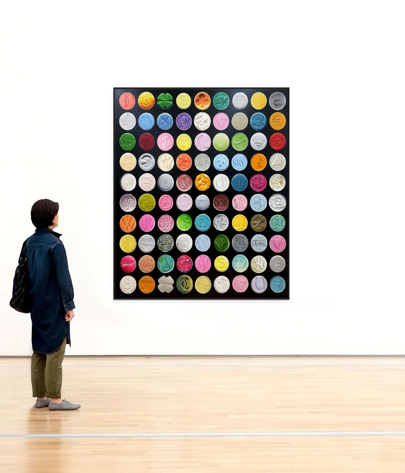 A grid of colorful, embossed circular objects arranged on a black background.