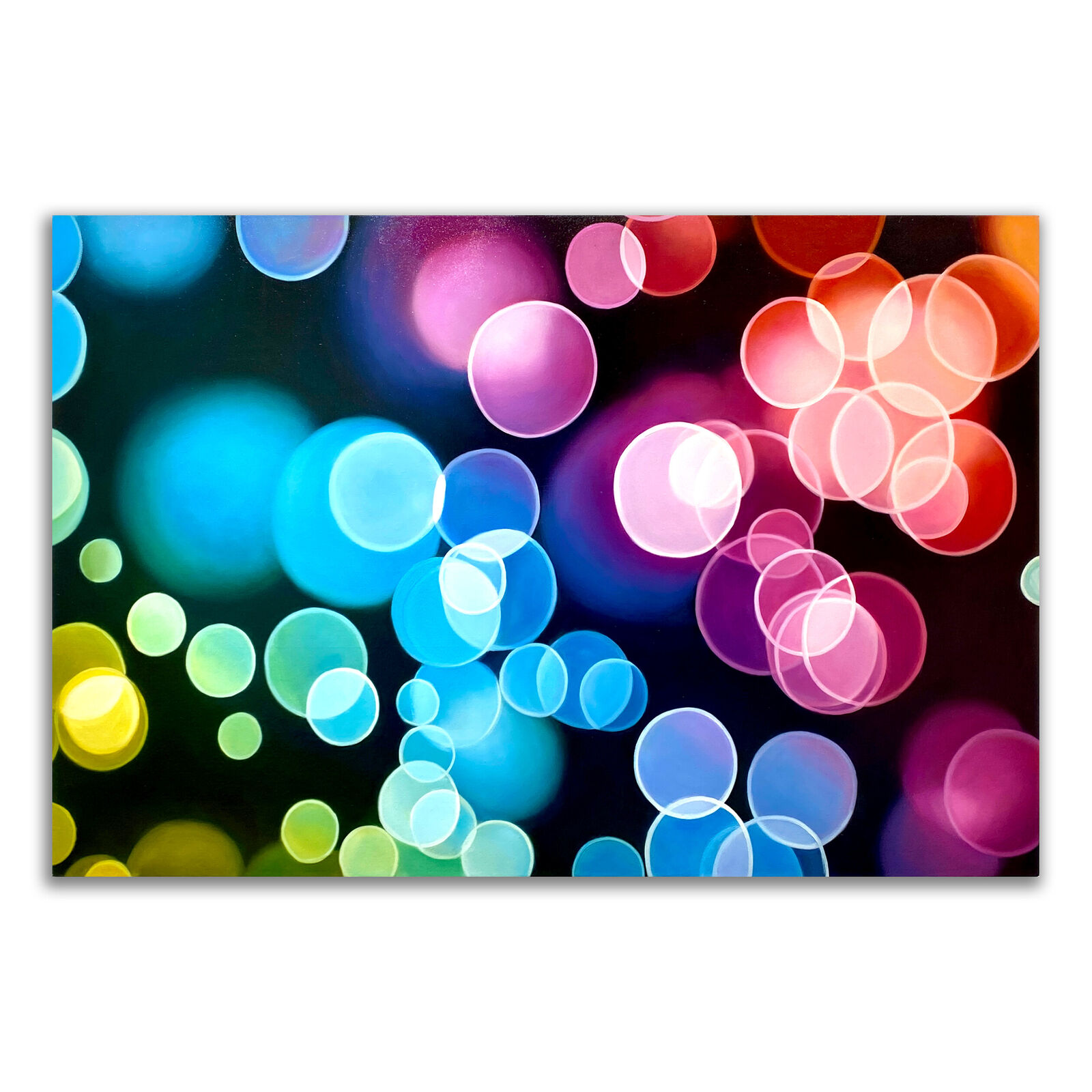 A picture of colorful circles on a black background.