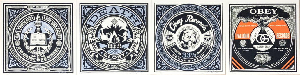 A set of four black and white posters with a skull on them.