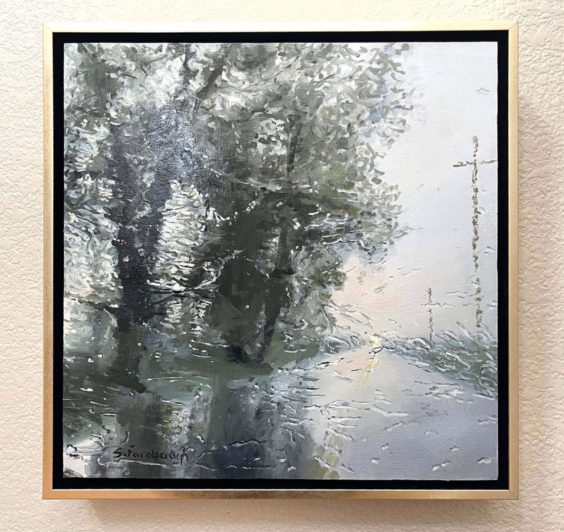 A painting of a tree in the middle of a snowy landscape.