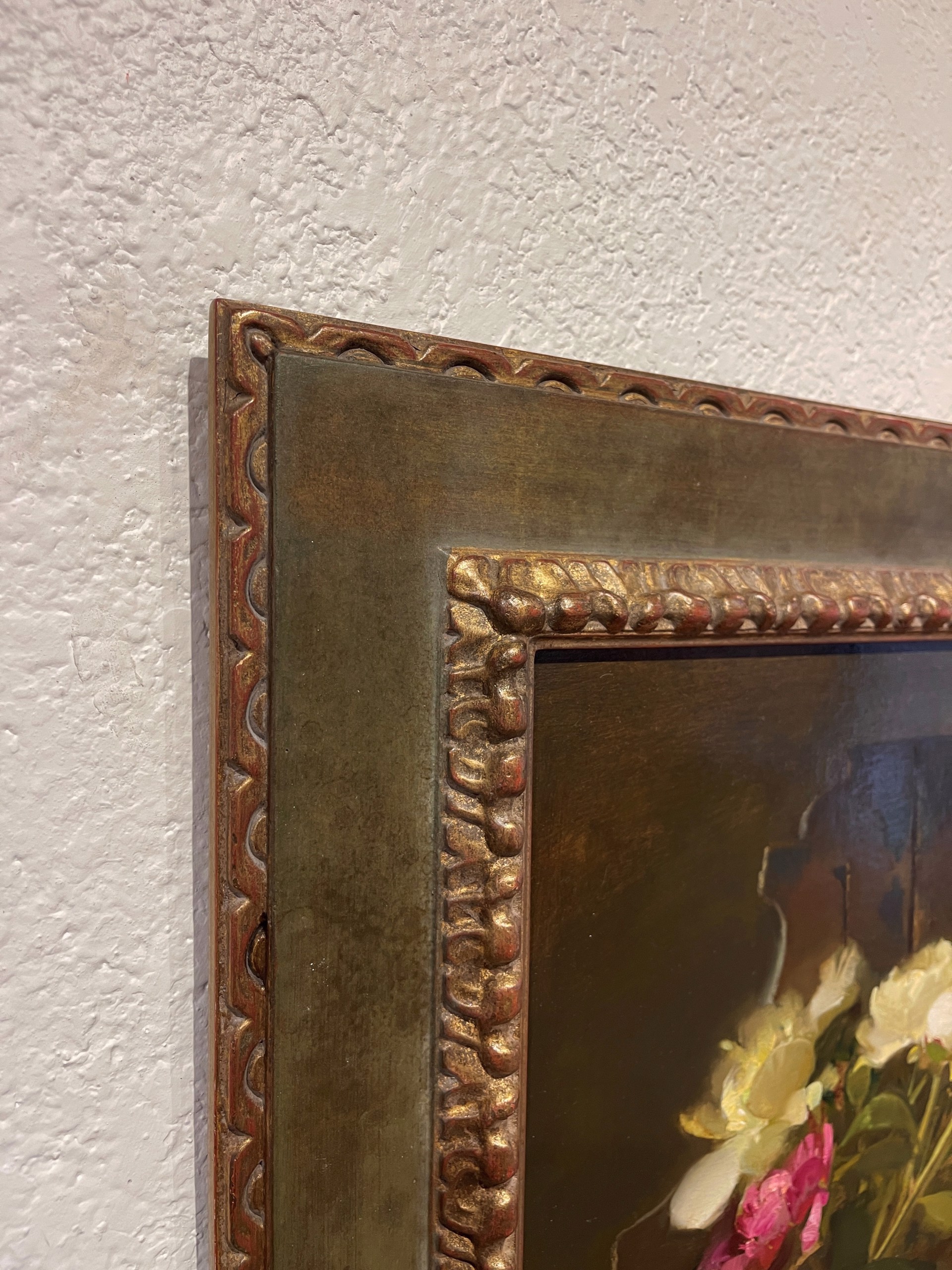 A painting of flowers in a vase on a table.