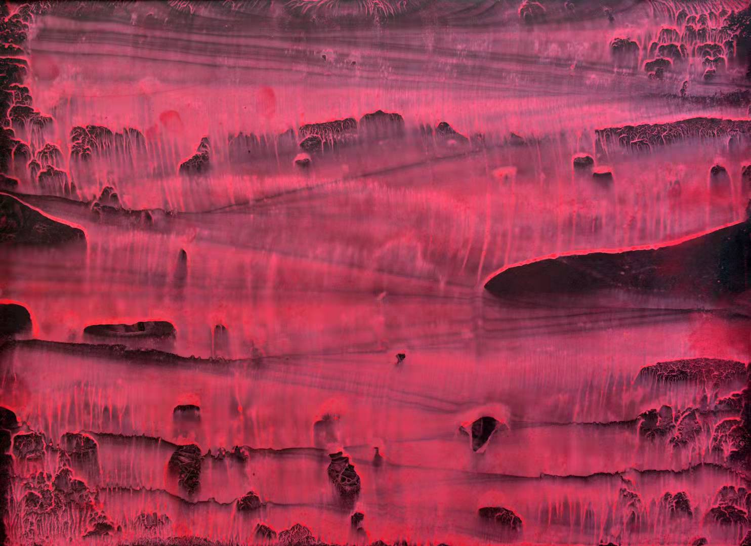 A surreal landscape of layered terraces glowing with intense red light.