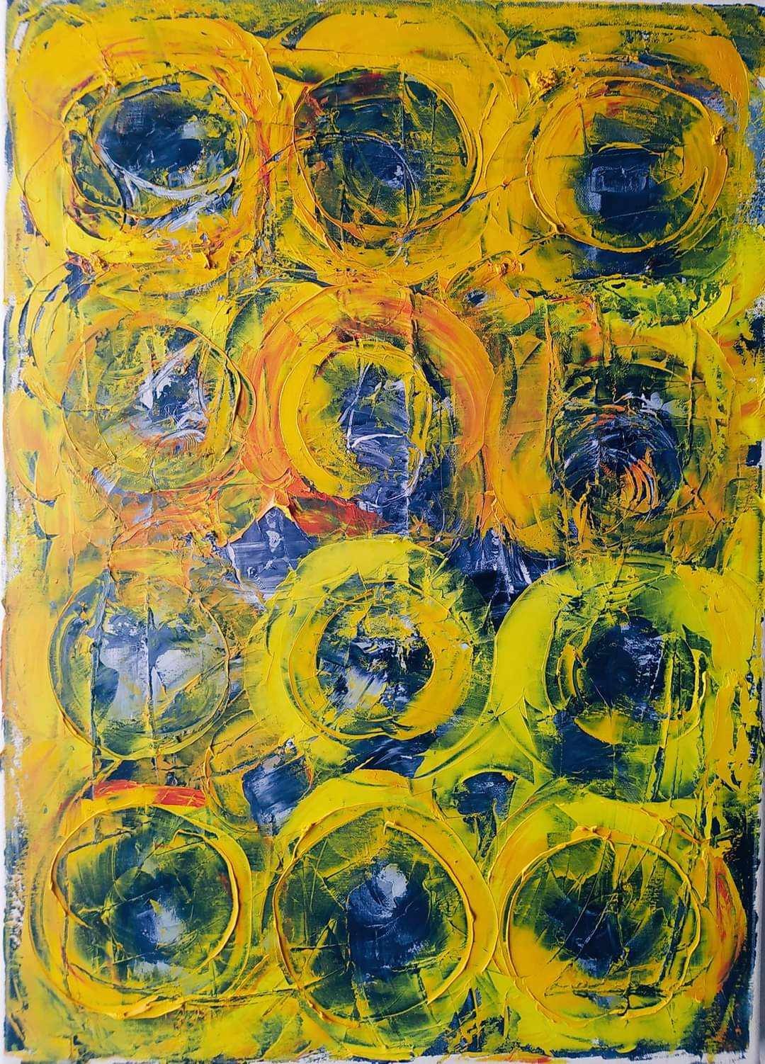 A vibrant abstract painting featuring bold yellow circles against a dark background.