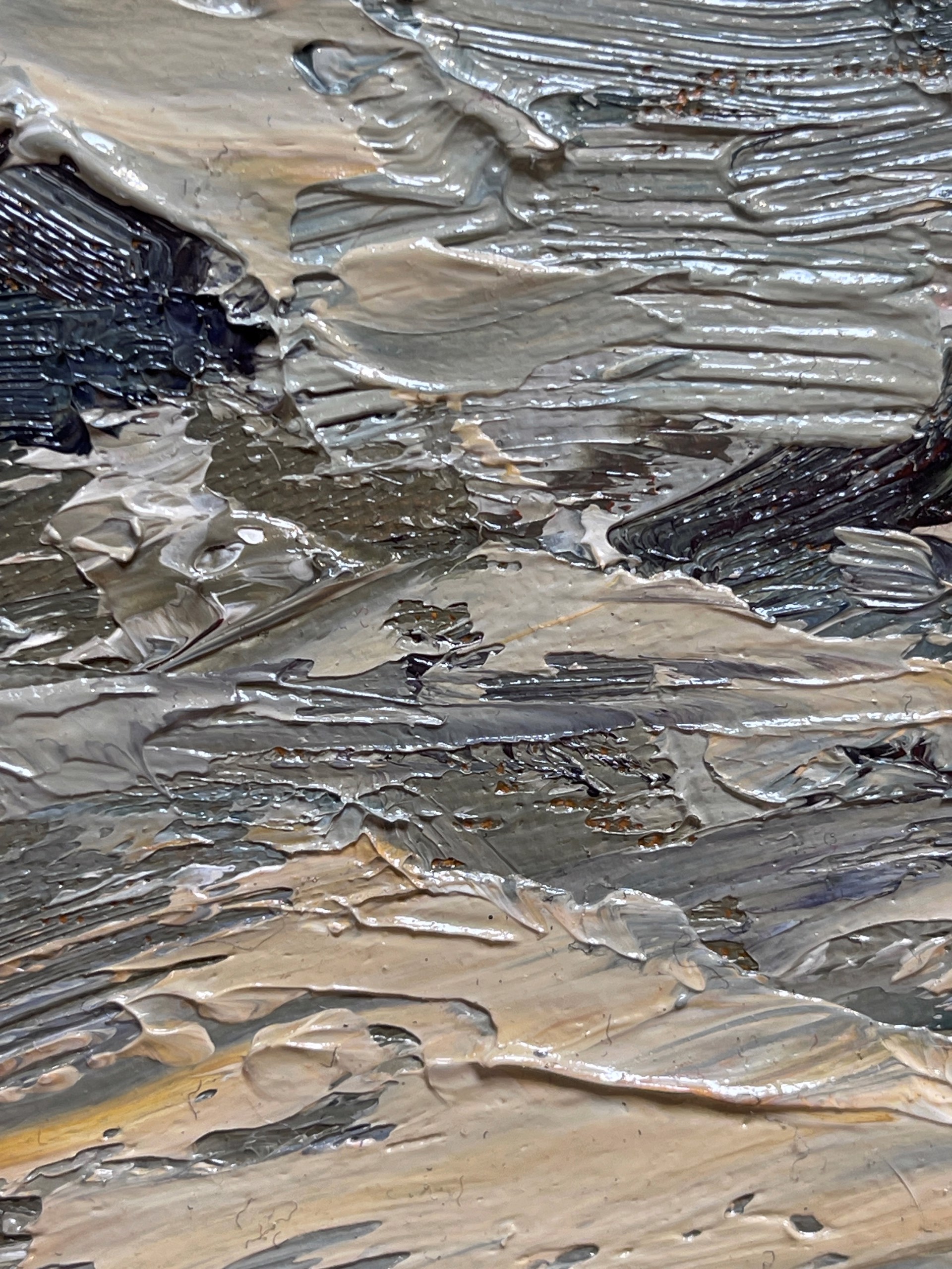 A painting of waves crashing on rocks in the ocean.