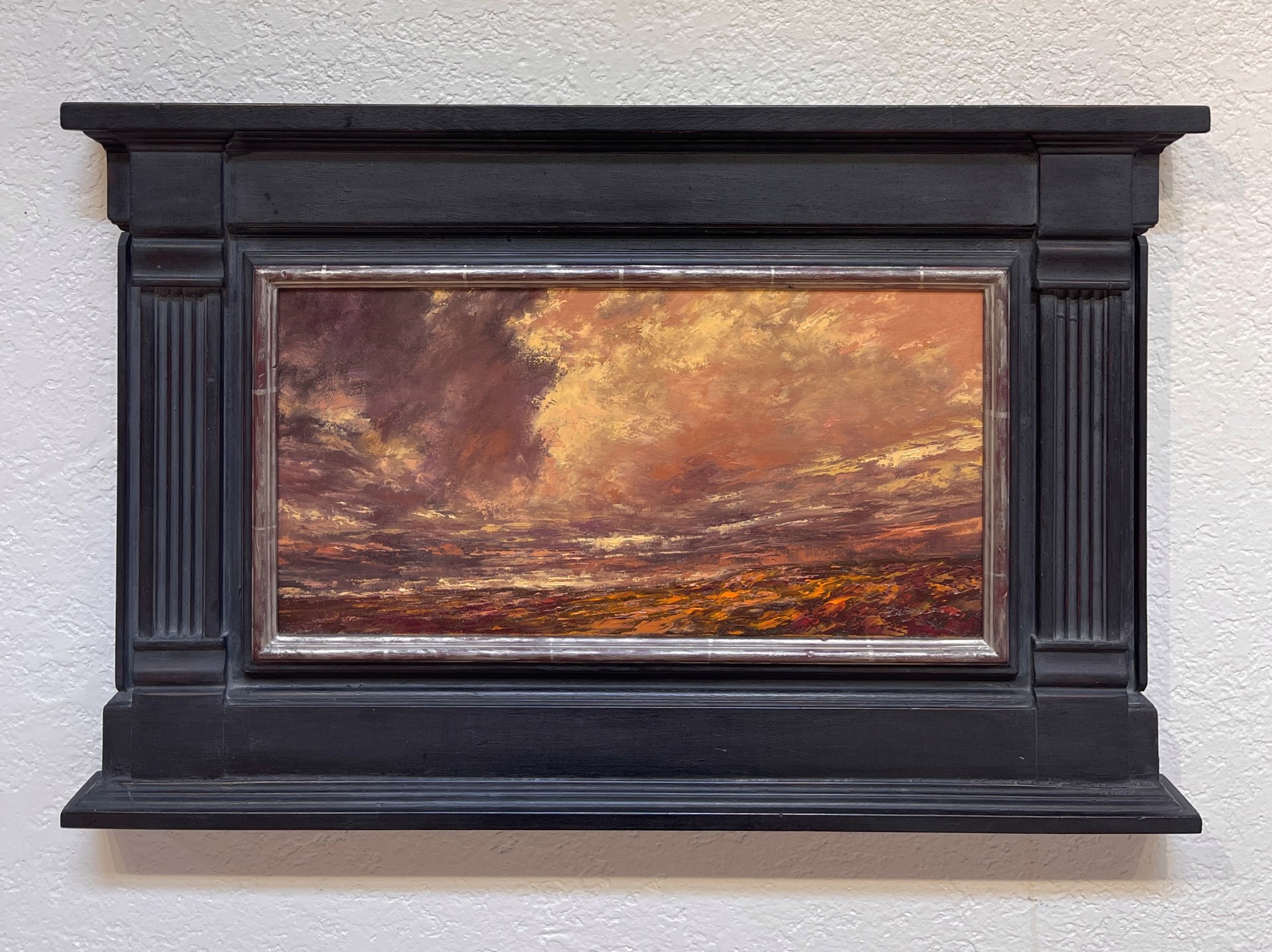 A painting of a cloudy sky over a body of water.