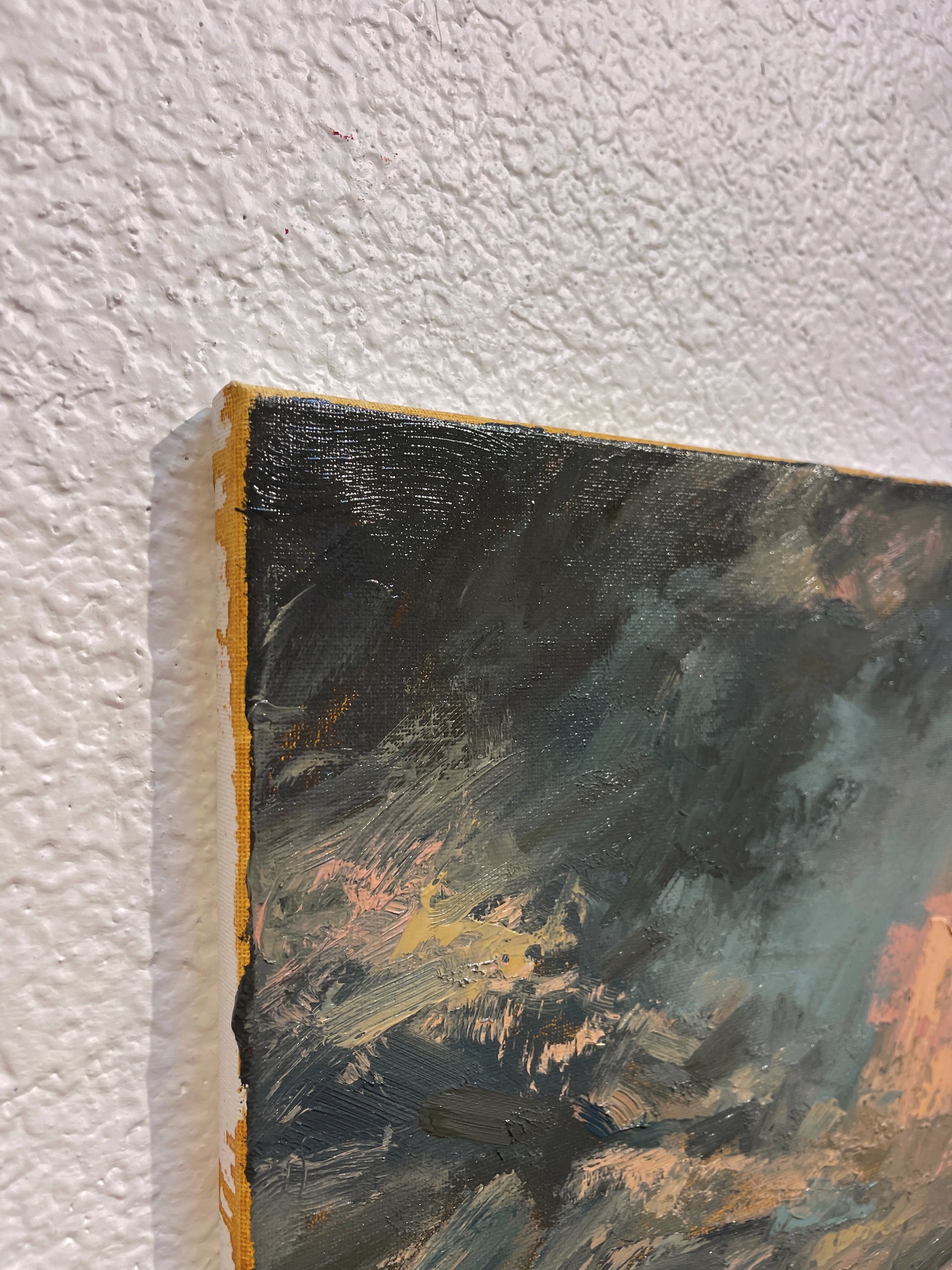 A painting of a cloudy sky over a body of water.
