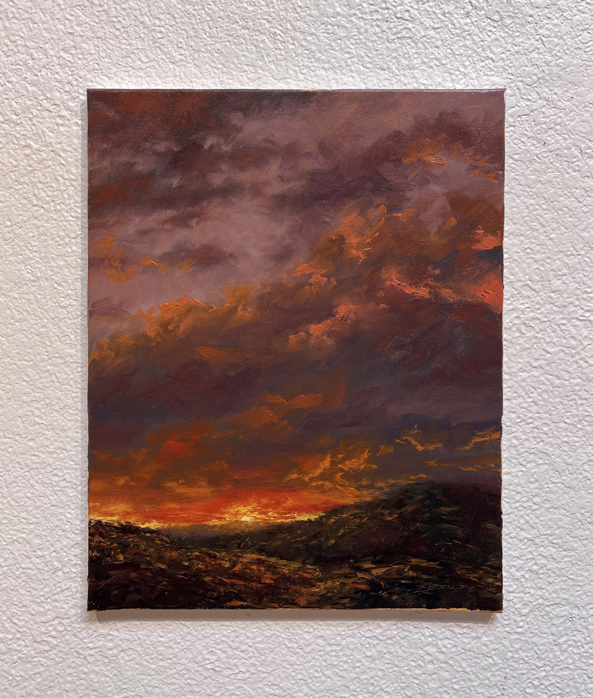 A painting of a sunset over a field of grass.