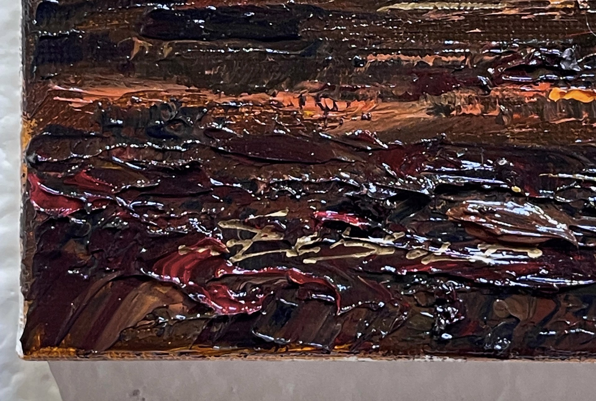 A painting of a sunset over a field of grass.