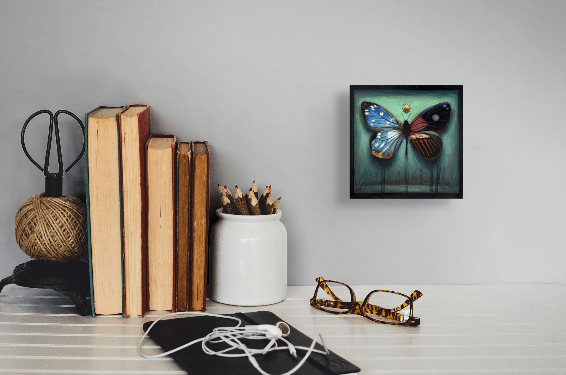 A painting of a butterfly and a ladybug on a green background.