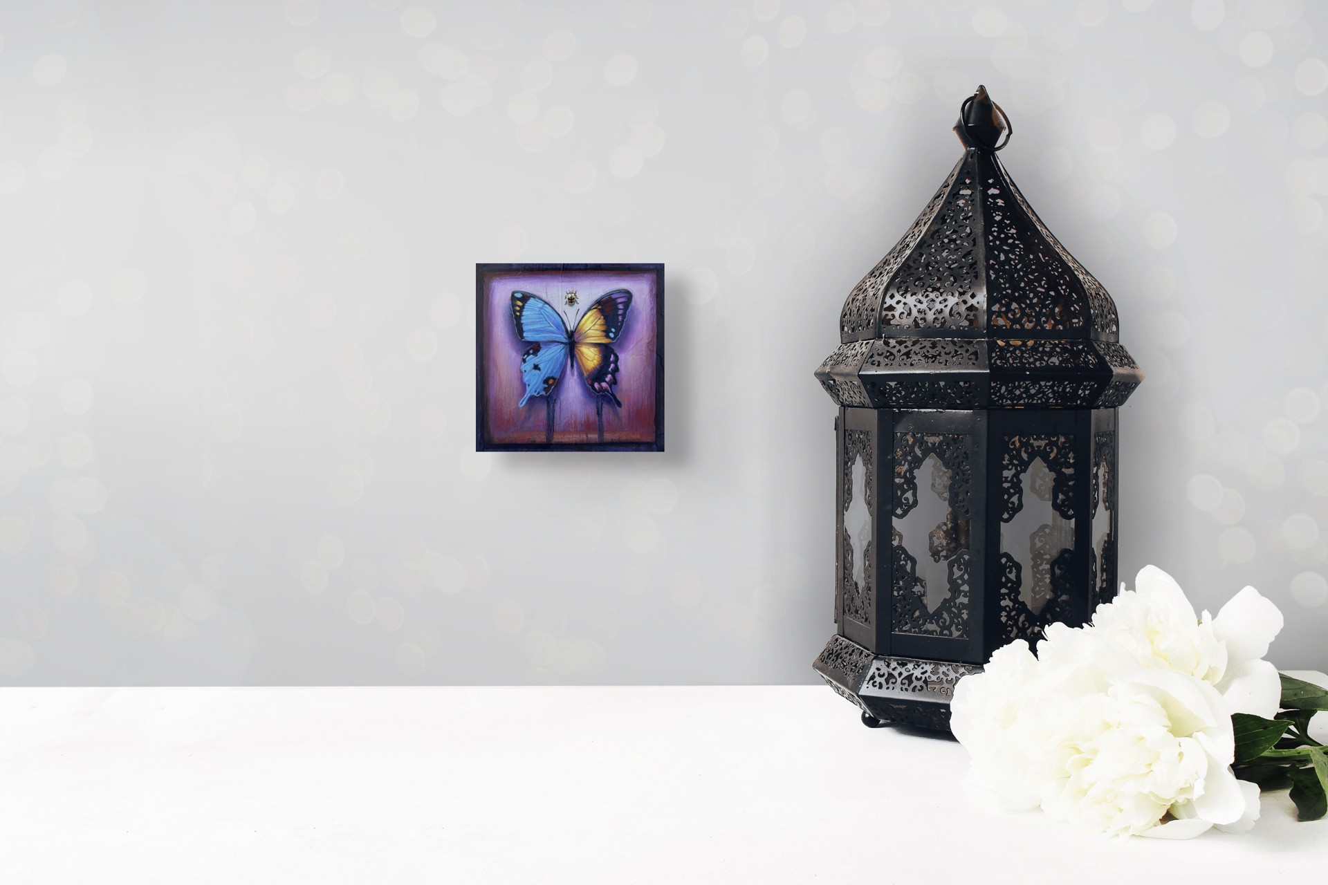A painting of a butterfly and a ladybug on a purple background.