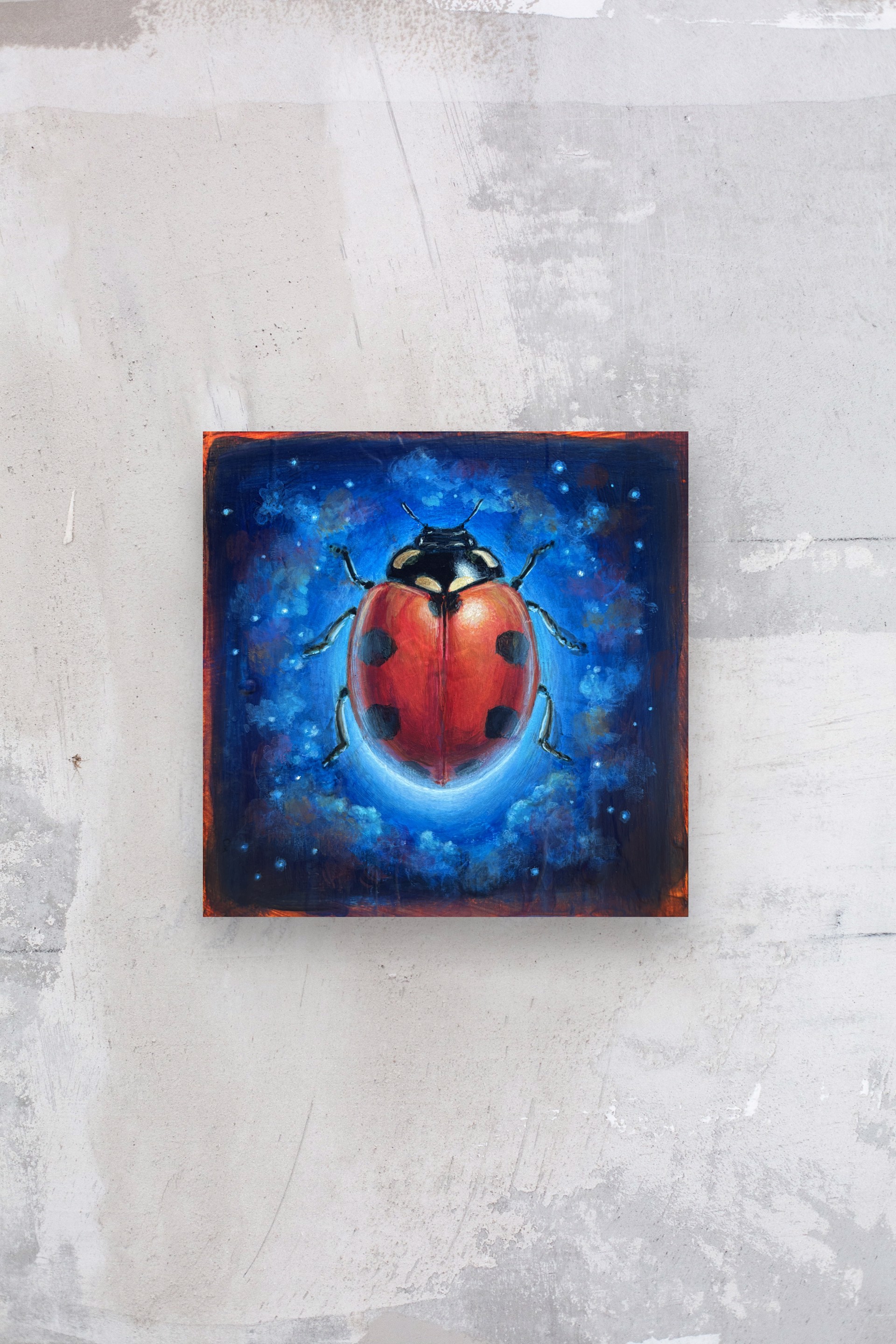 A cosmic ladybug hovering in a starry night sky.