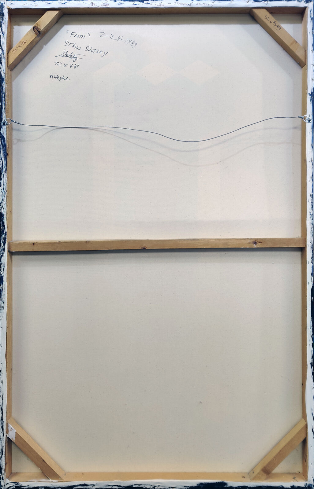 A colorful cube with a black background. 