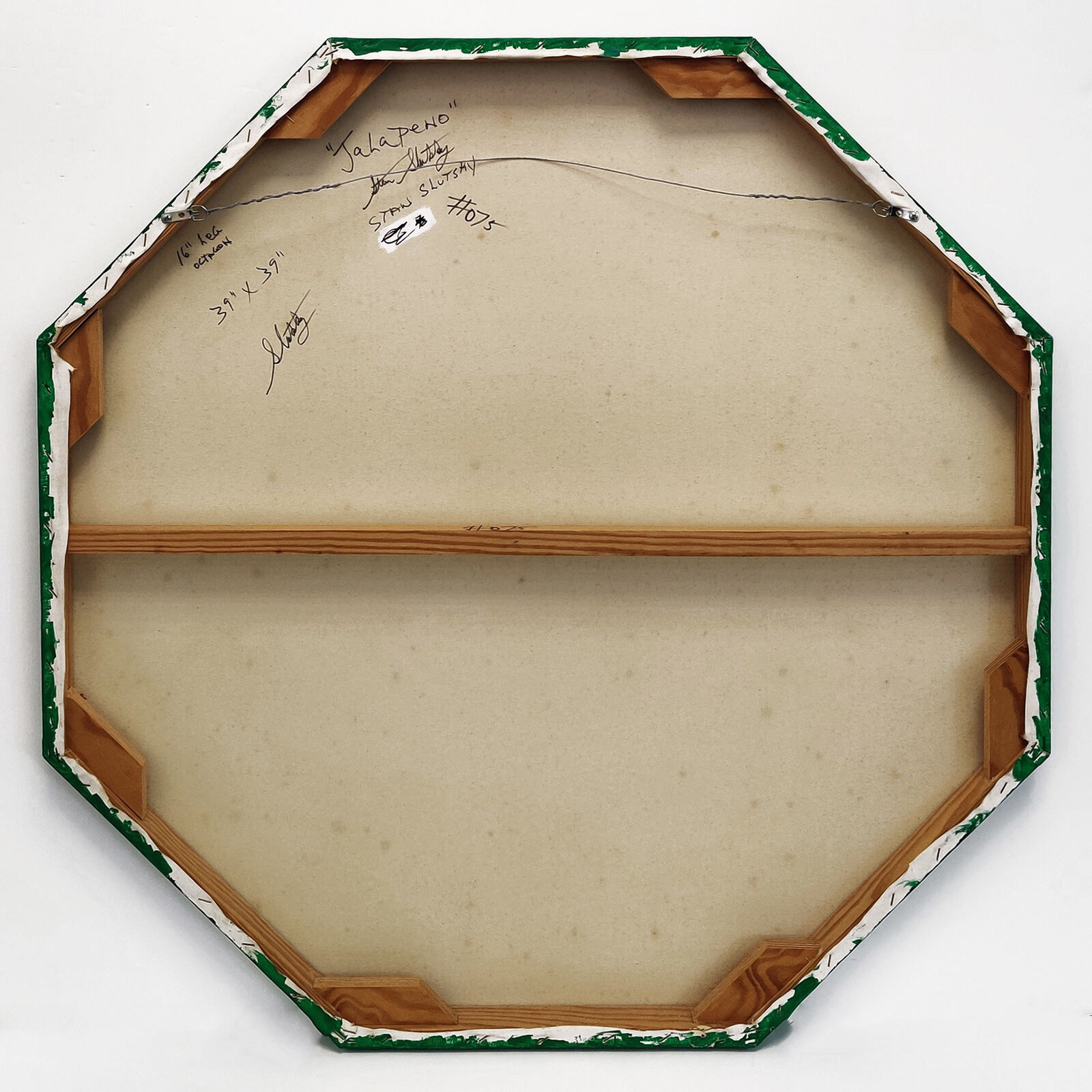 A green and yellow circular pattern on a white background.