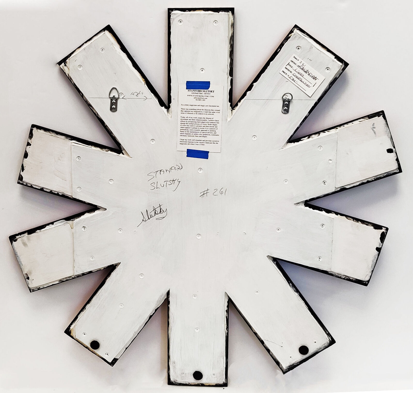 A drawing of a colorful star made out of colored pencils.