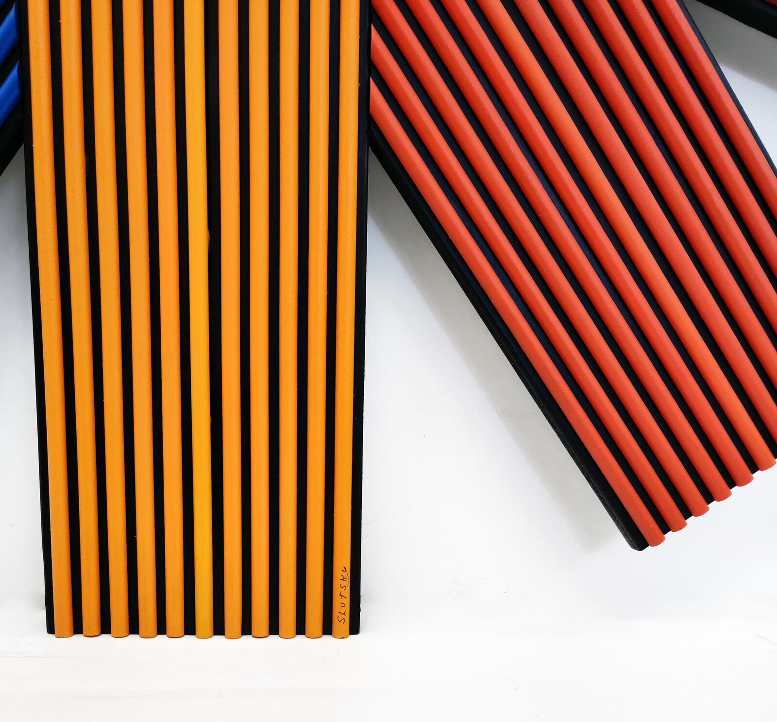 A drawing of a colorful star made out of colored pencils.