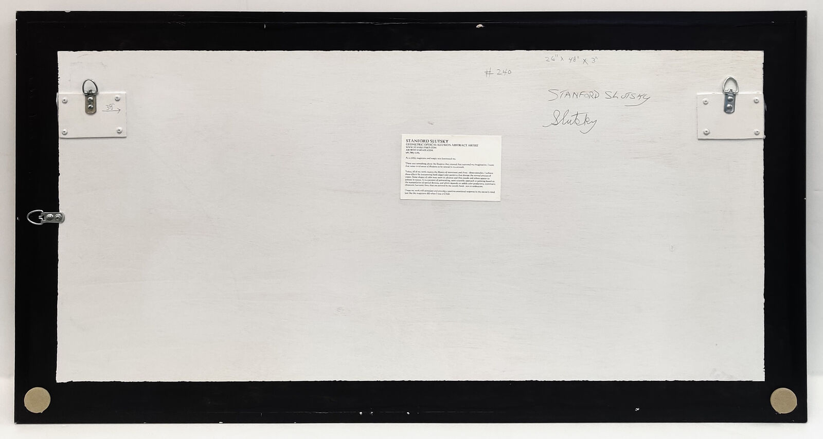 A black frame with a bunch of colored pencils on it.