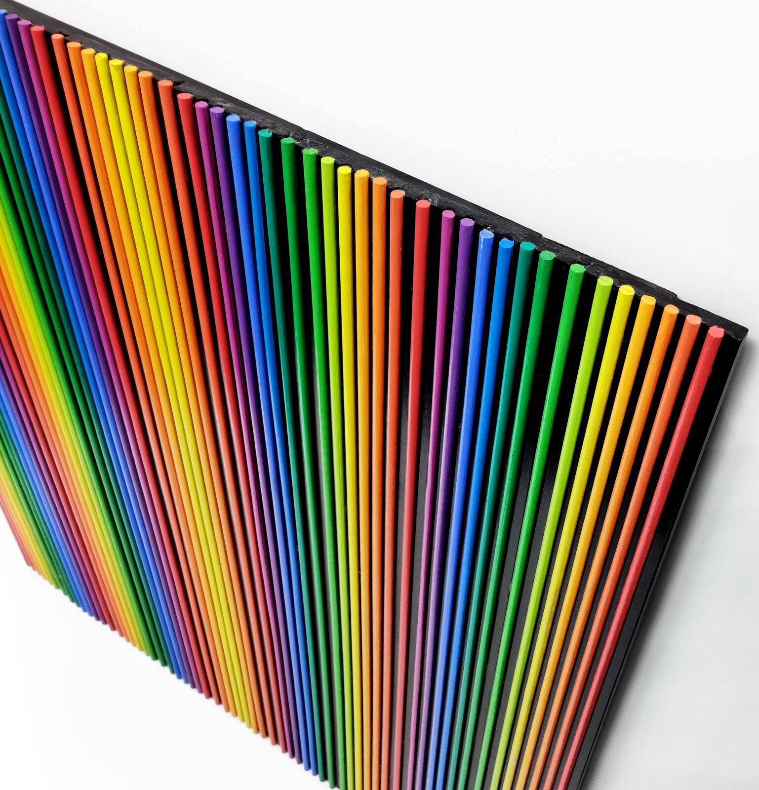A rainbow colored striped pattern on a white background.